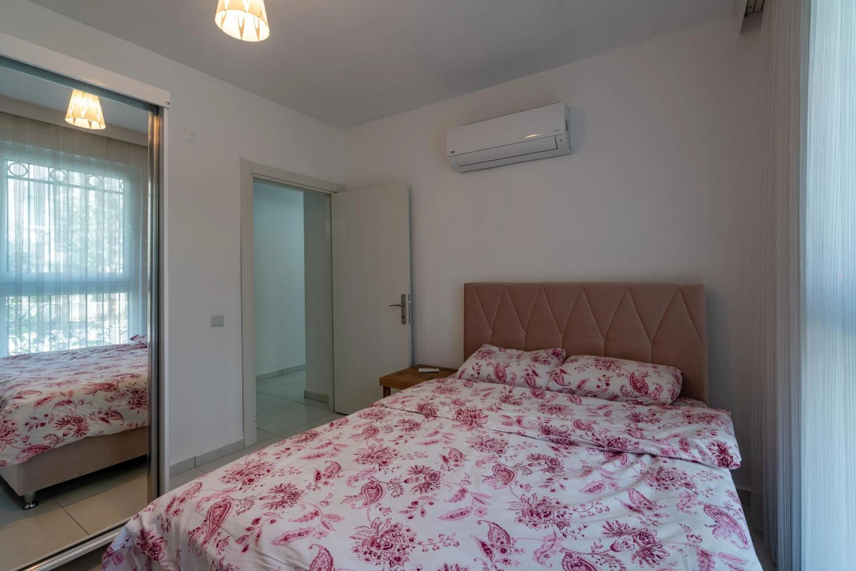 Bed in Sare Suites Downtown