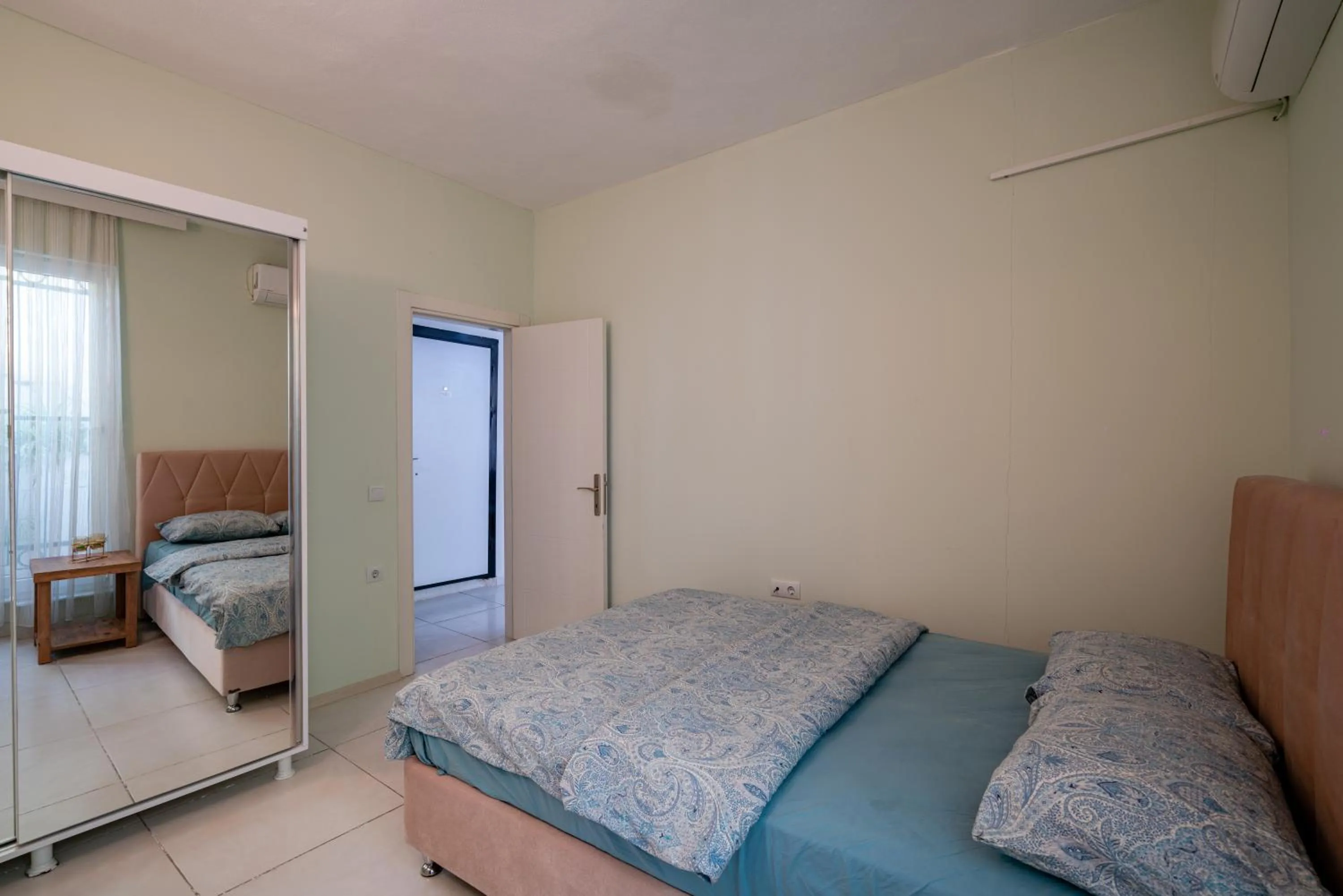 Bed in Sare Suites Downtown