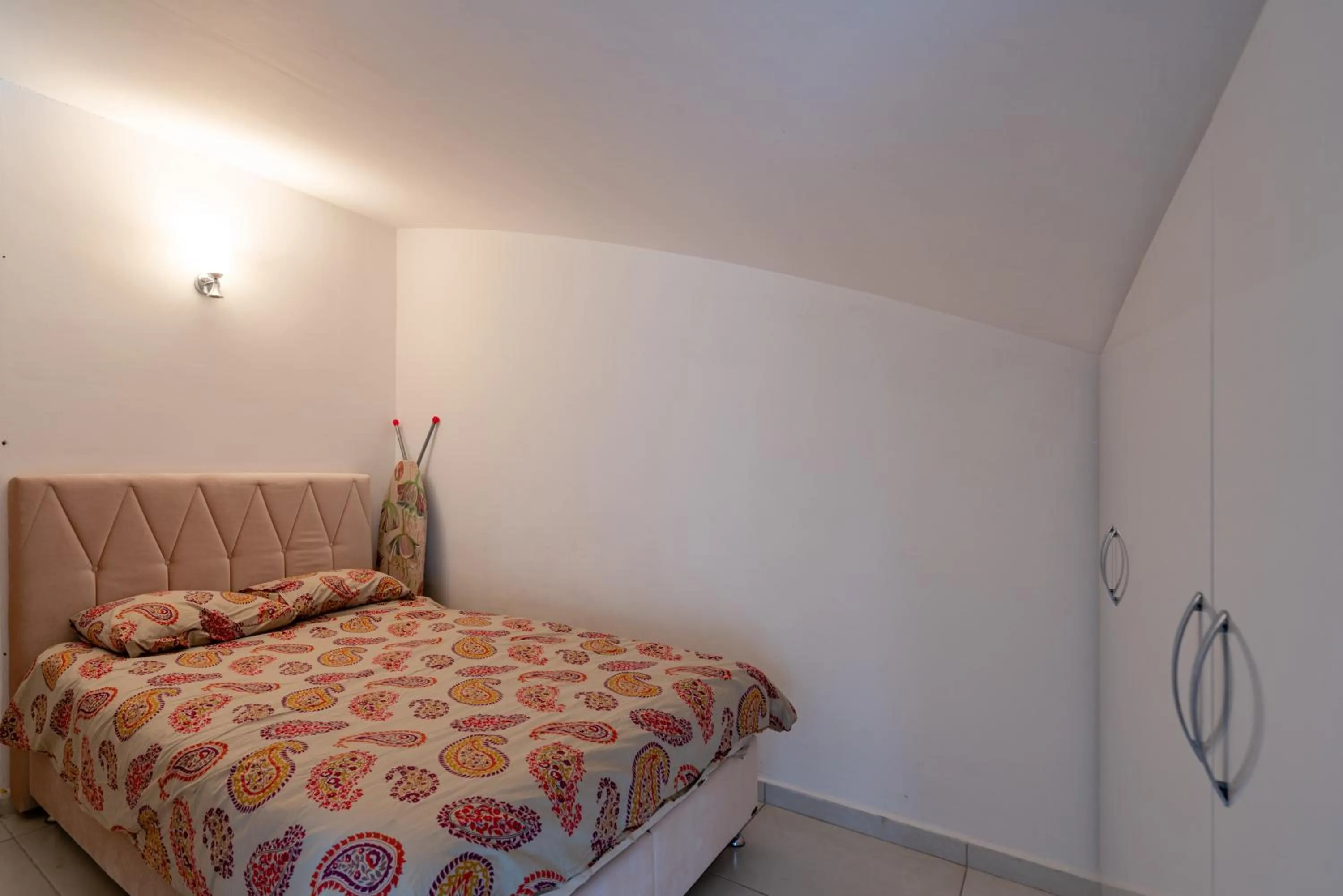 Bed in Sare Suites Downtown