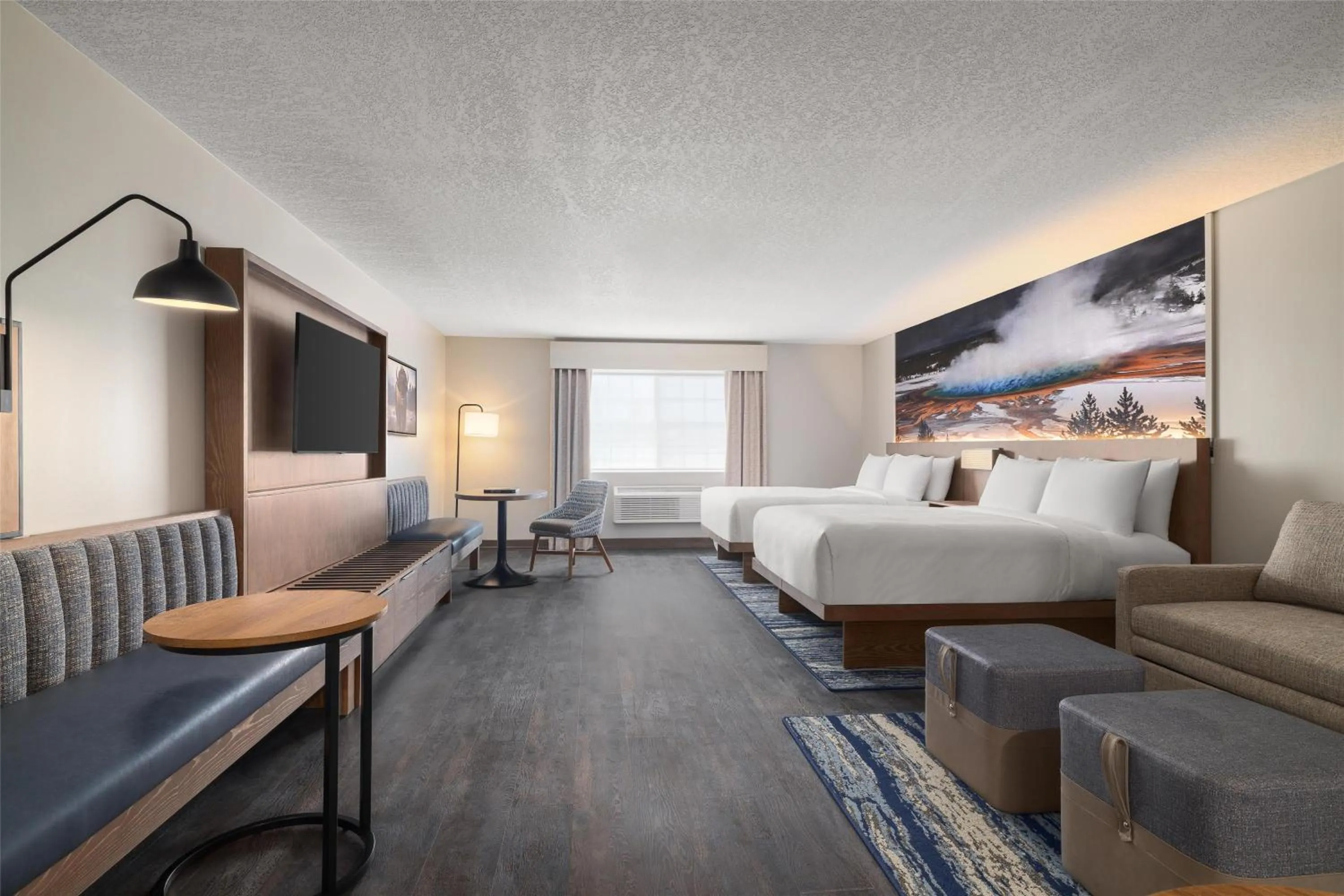 Living room, Bed in Starlite Yellowstone, Tapestry Collection by Hilton