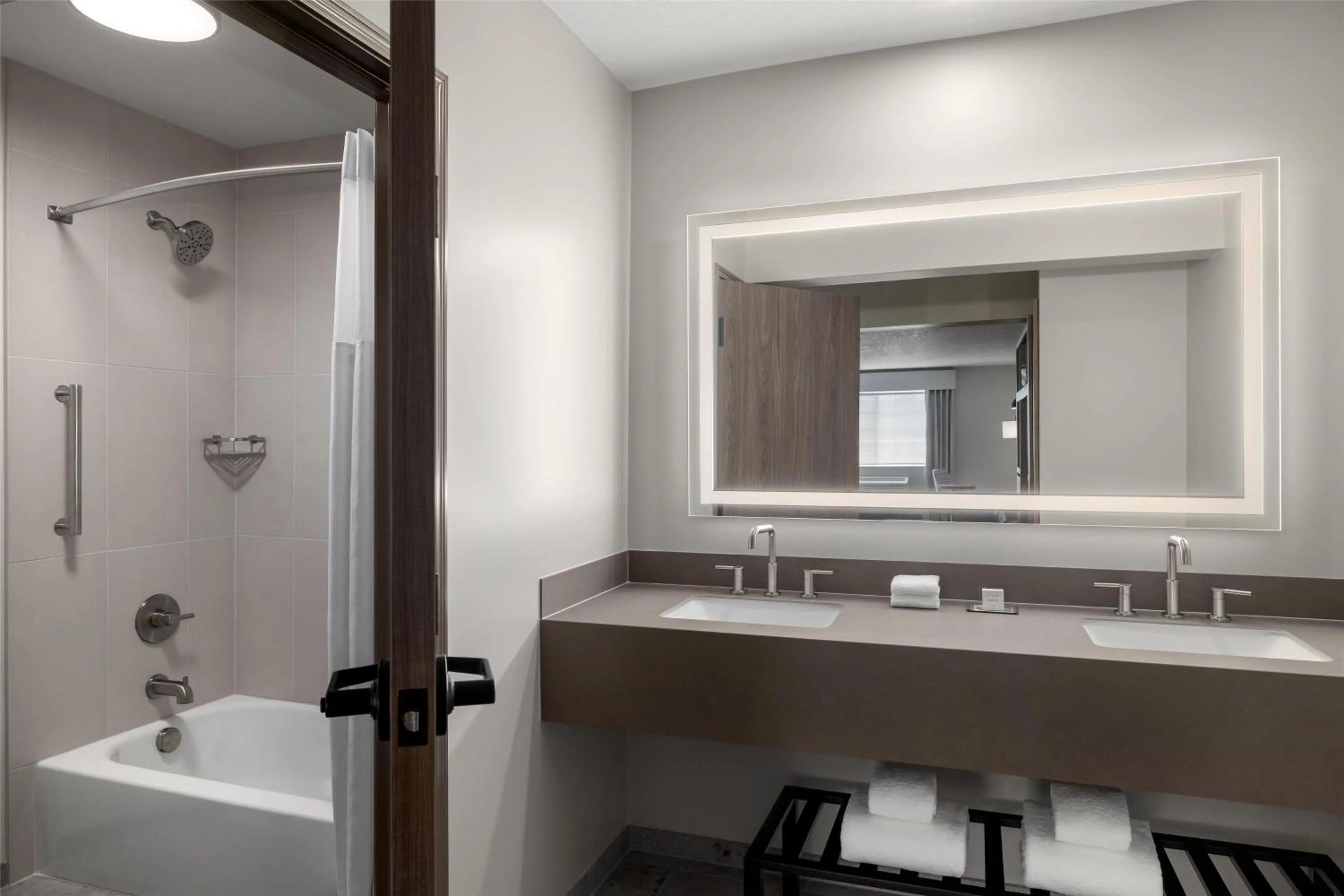 Bathroom in Starlite Yellowstone, Tapestry Collection by Hilton