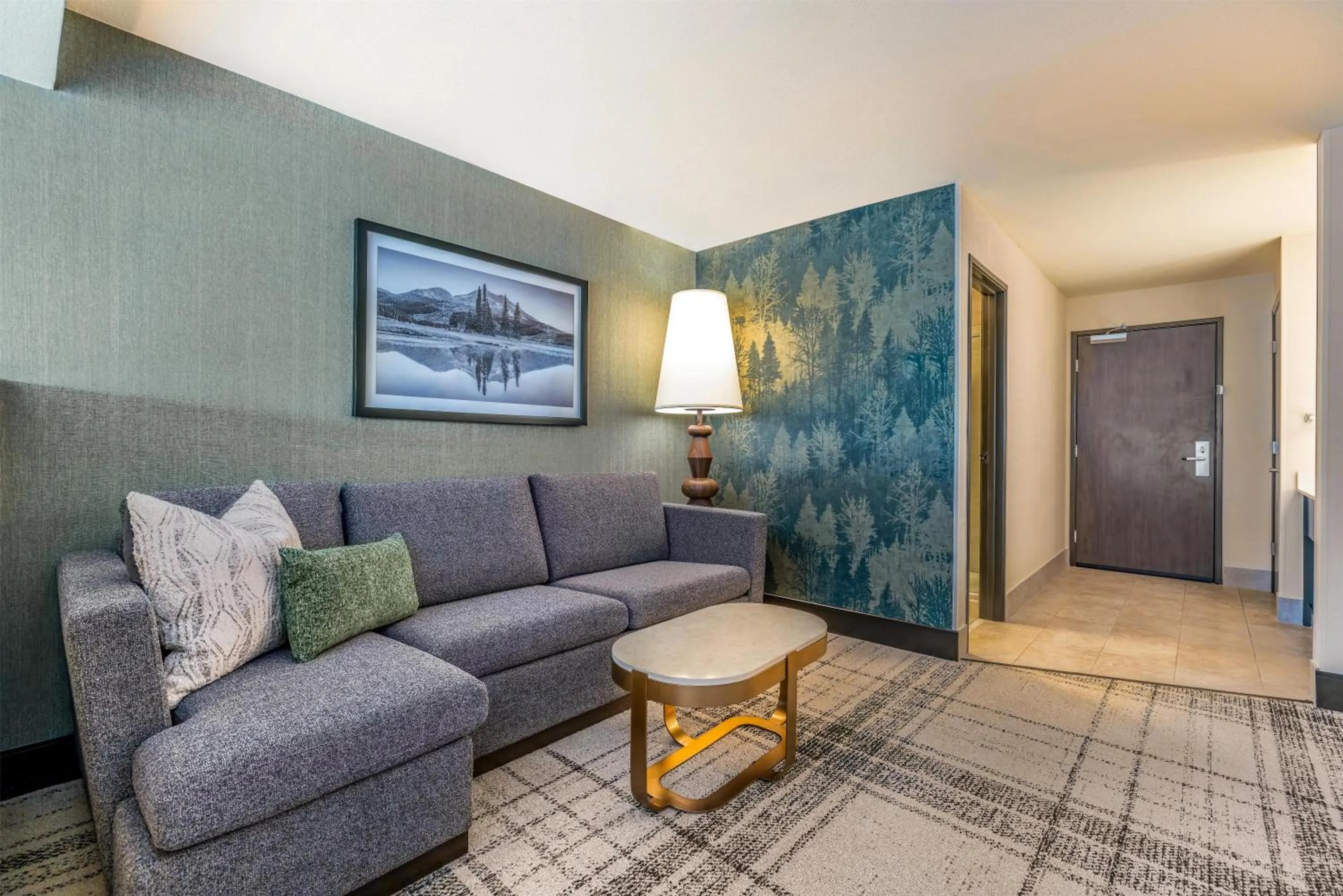 Living room in The Newberry Hotel Bend, Tapestry Collection by Hilton