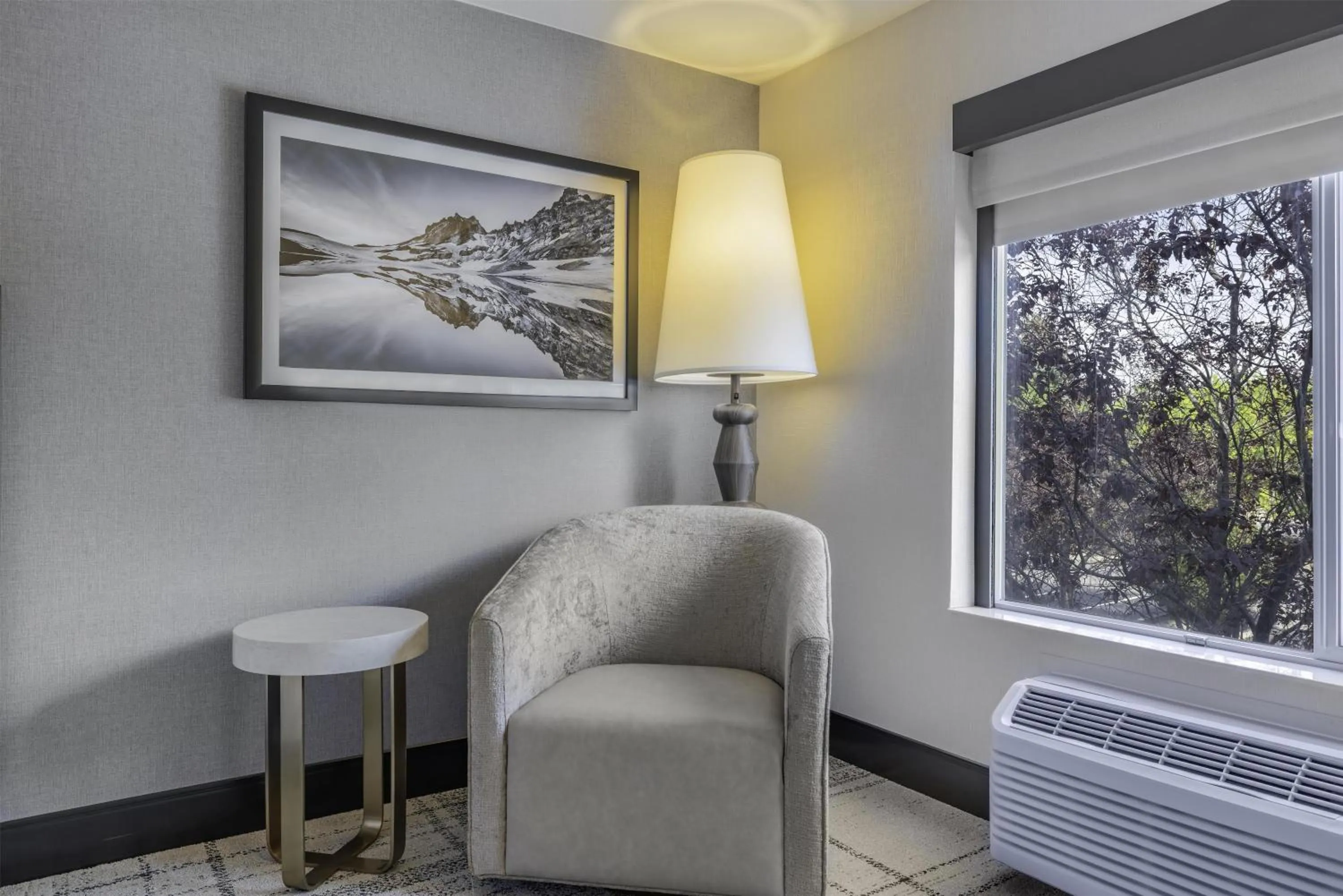 Living room in The Newberry Hotel Bend, Tapestry Collection by Hilton
