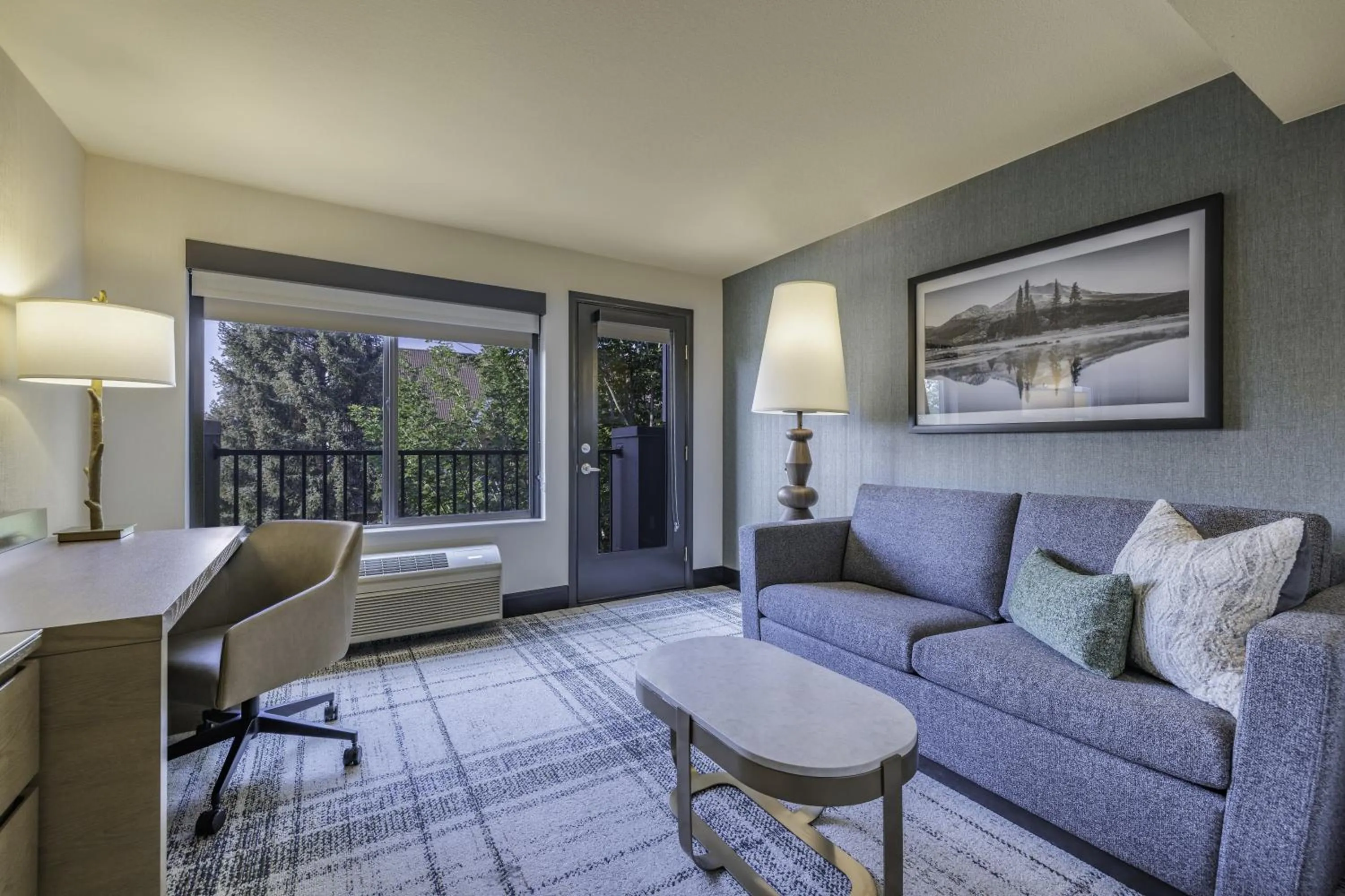 Living room in The Newberry Hotel Bend, Tapestry Collection by Hilton