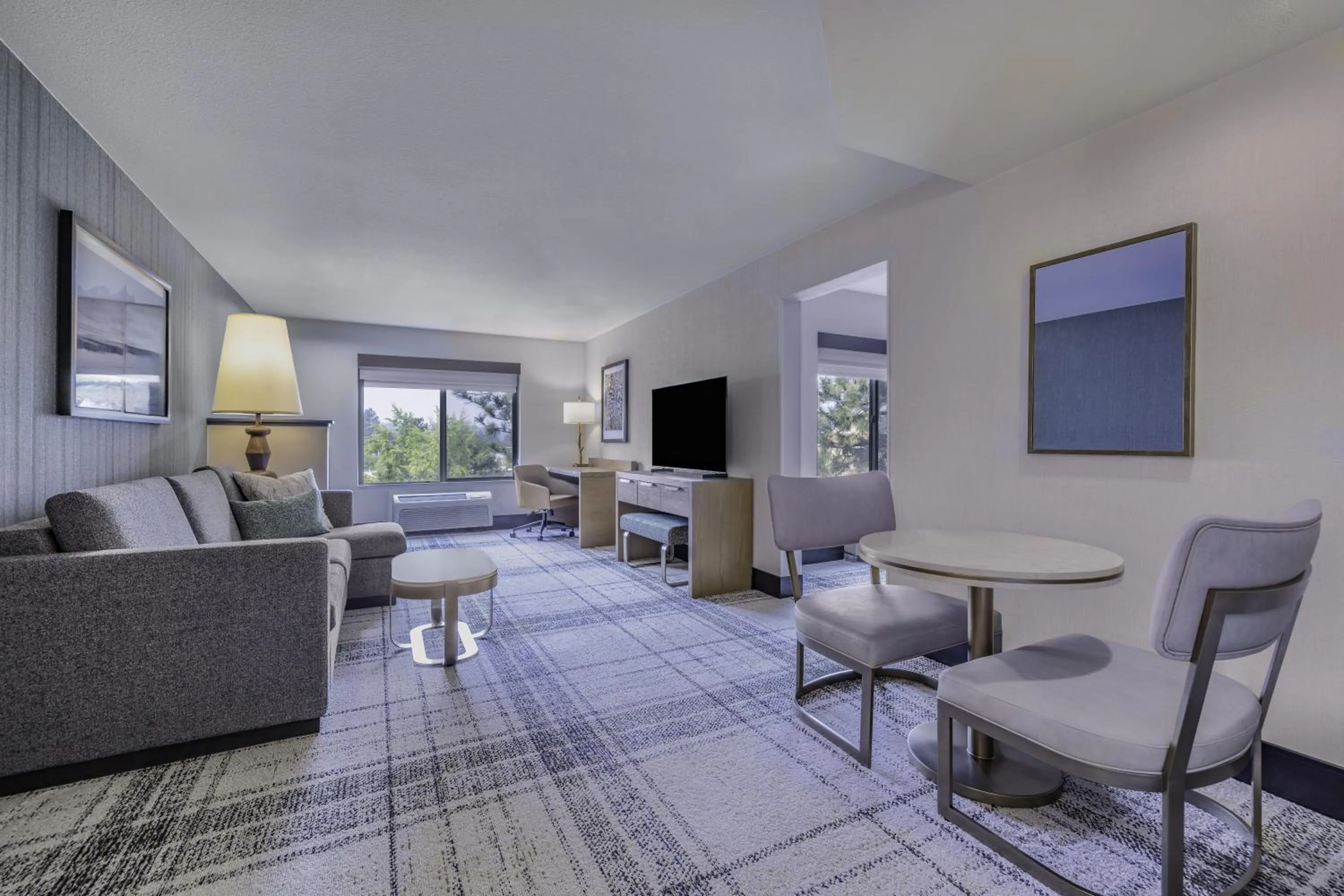 Living room in The Newberry Hotel Bend, Tapestry Collection by Hilton