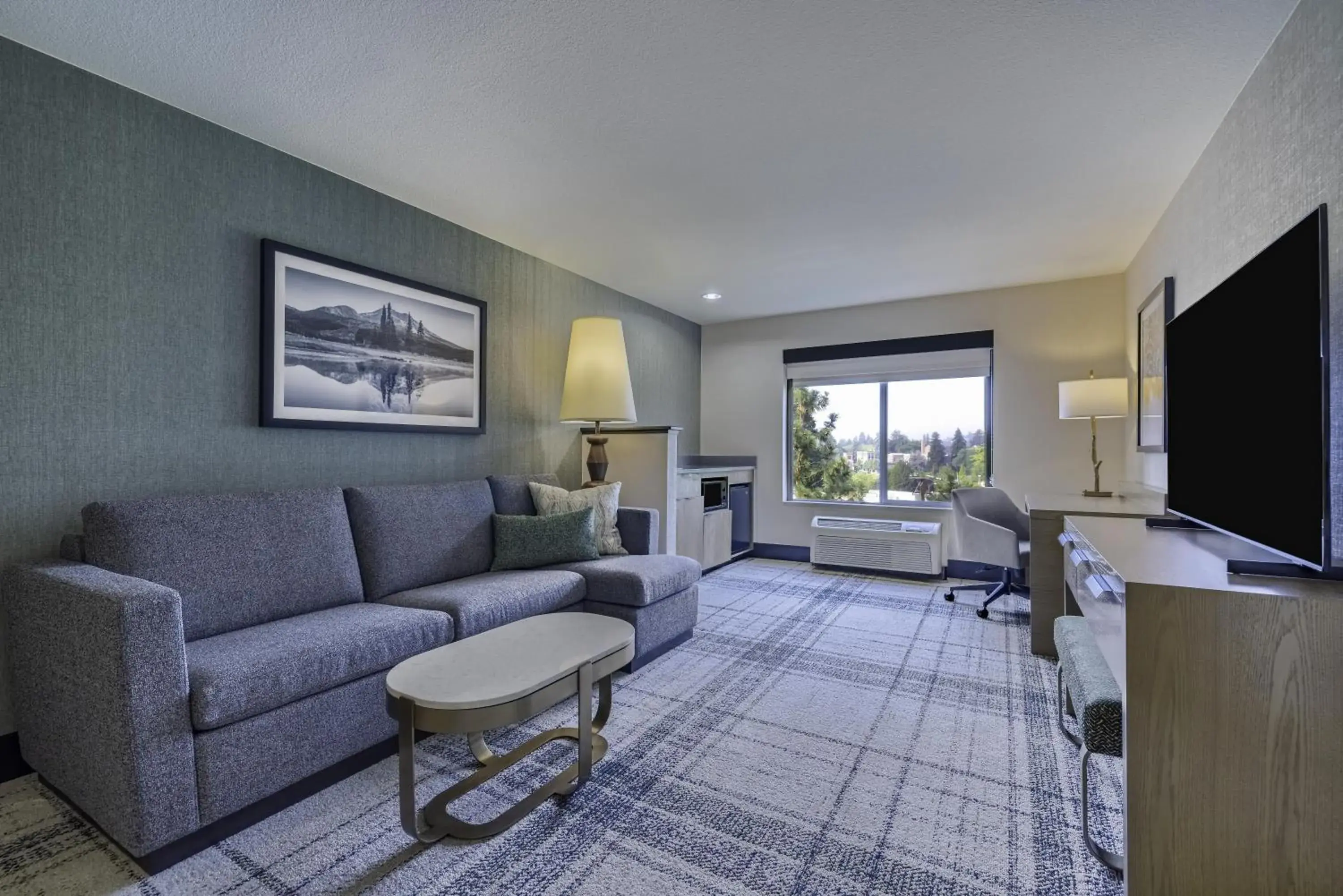 Living room in The Newberry Hotel Bend, Tapestry Collection by Hilton Living room in The Newberry Hotel Bend, Tapestry Collection by Hilton