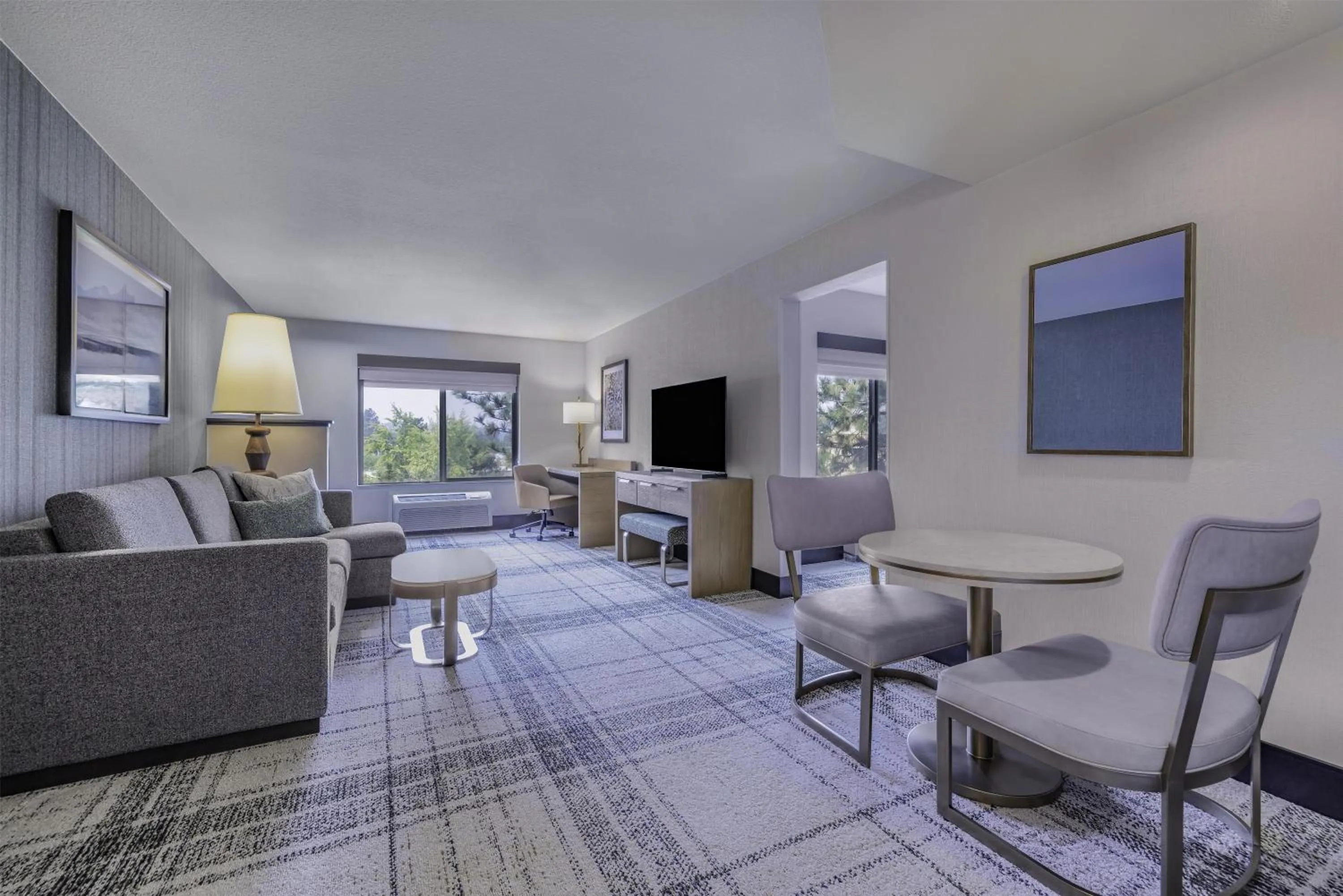 Living room in The Newberry Hotel Bend, Tapestry Collection by Hilton