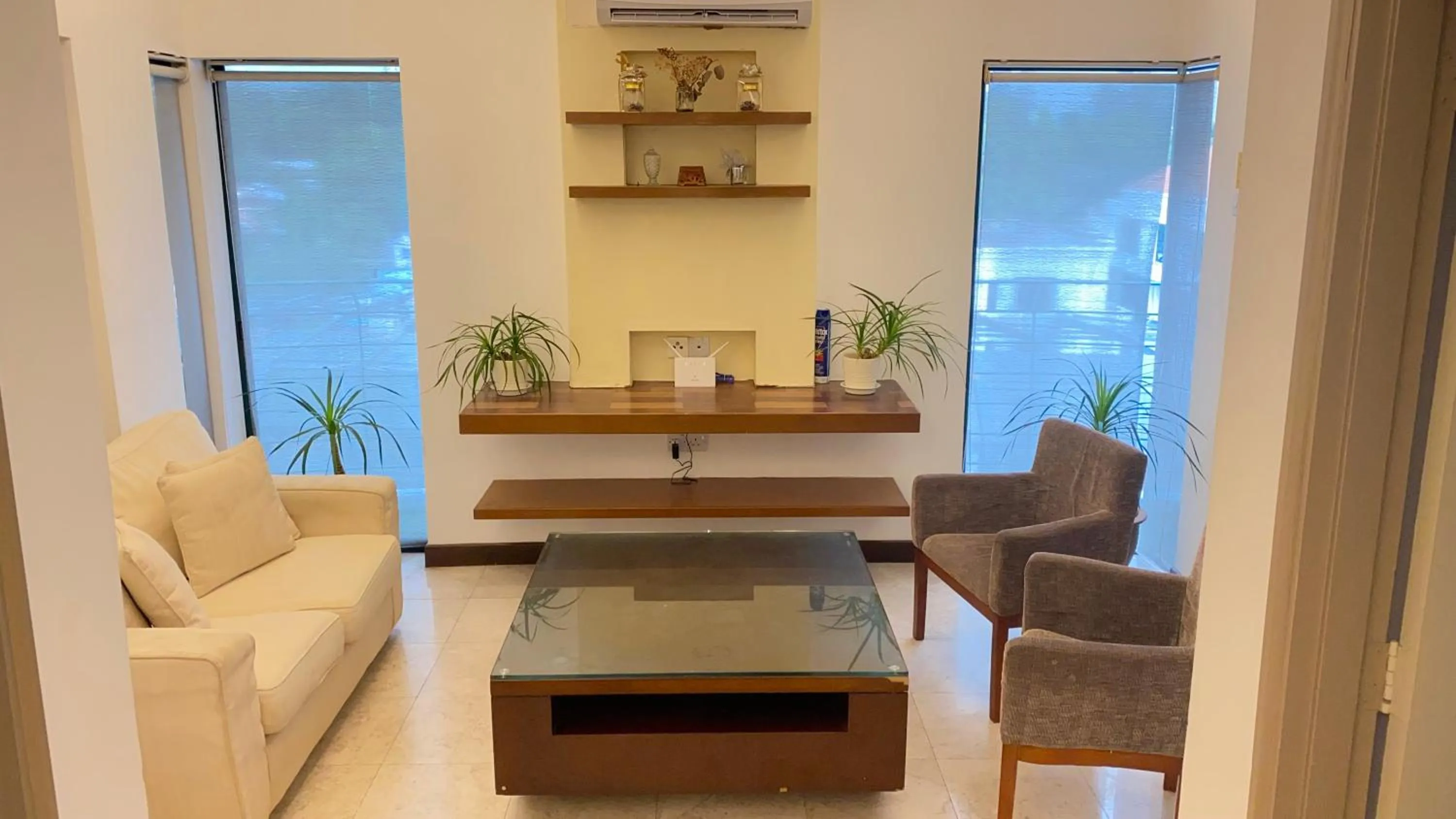 Living room in Peninsula Residence All Suite Hotel