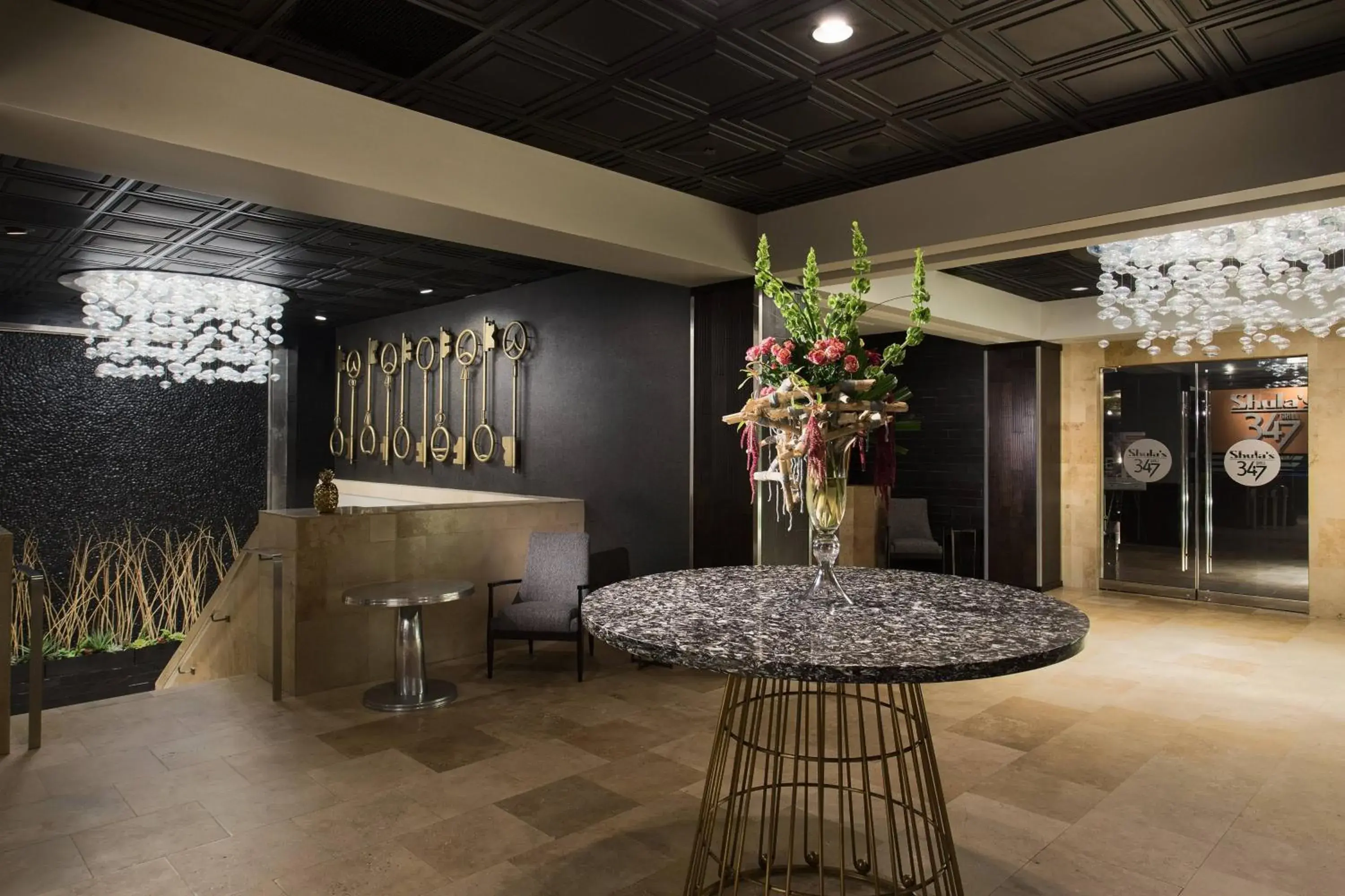 Lobby or reception in Hotel Duval, Autograph Collection Lobby or reception in Hotel Duval, Autograph Collection