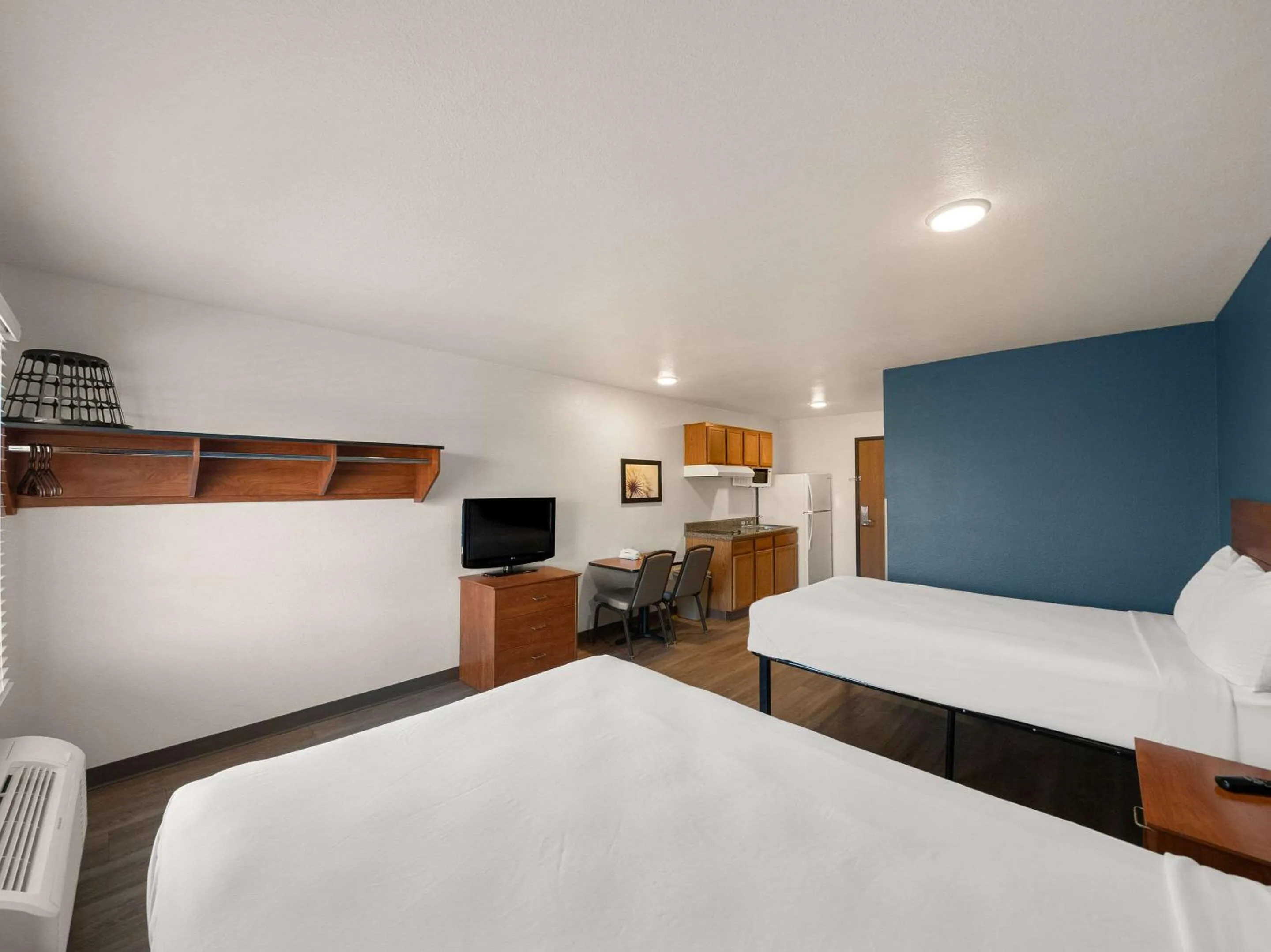 Bedroom, Bed in WoodSpring Suites Dallas Rockwall