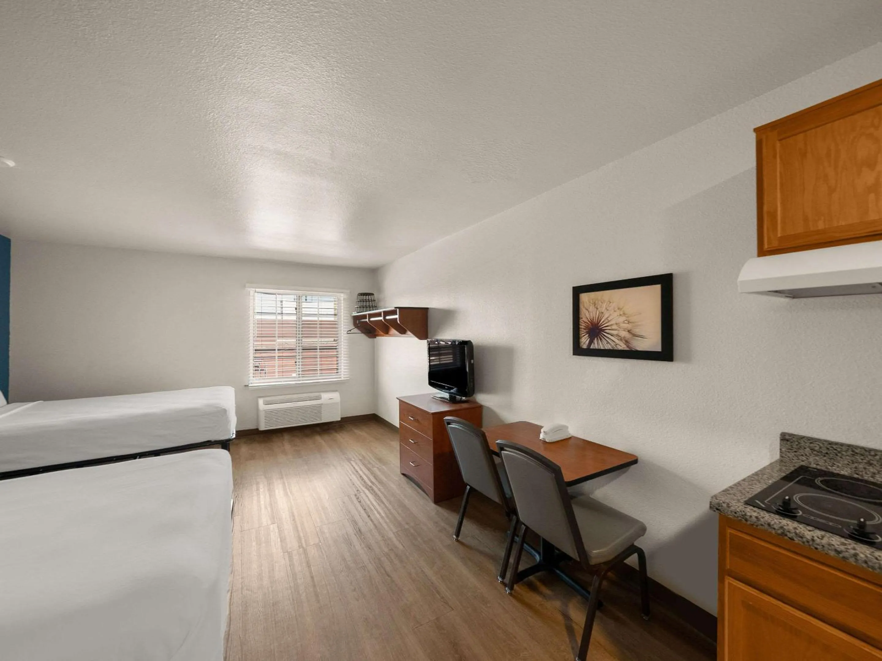 Bedroom, Bed in WoodSpring Suites Dallas Rockwall