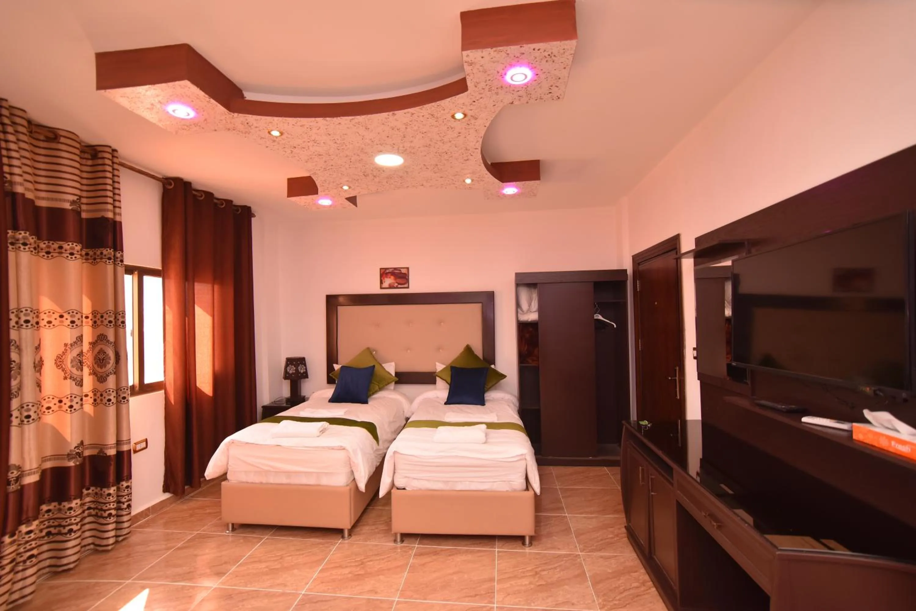 Photo of the whole room, Bed in Petra Guests Hotel