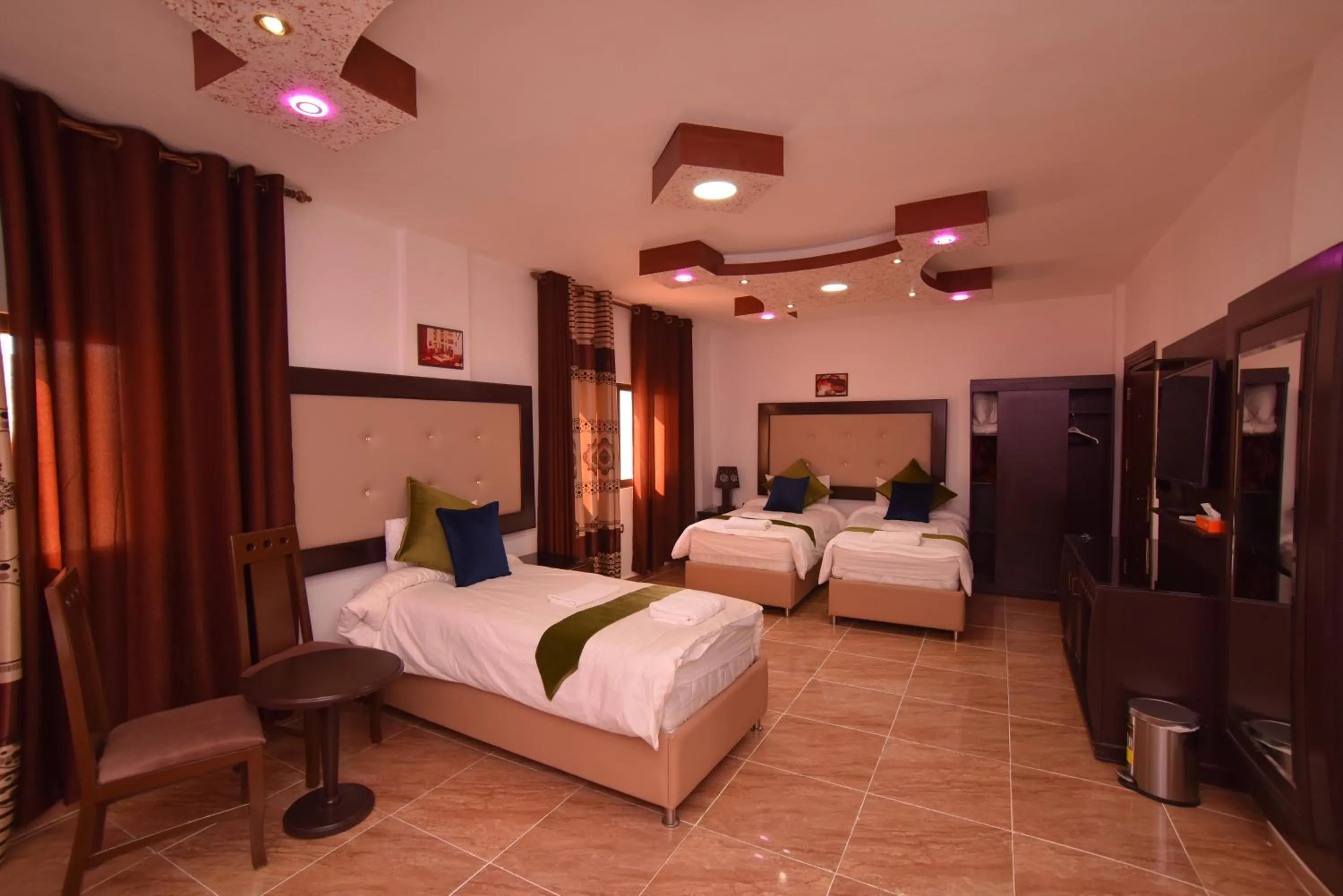 Photo of the whole room, Bed in Petra Guests Hotel