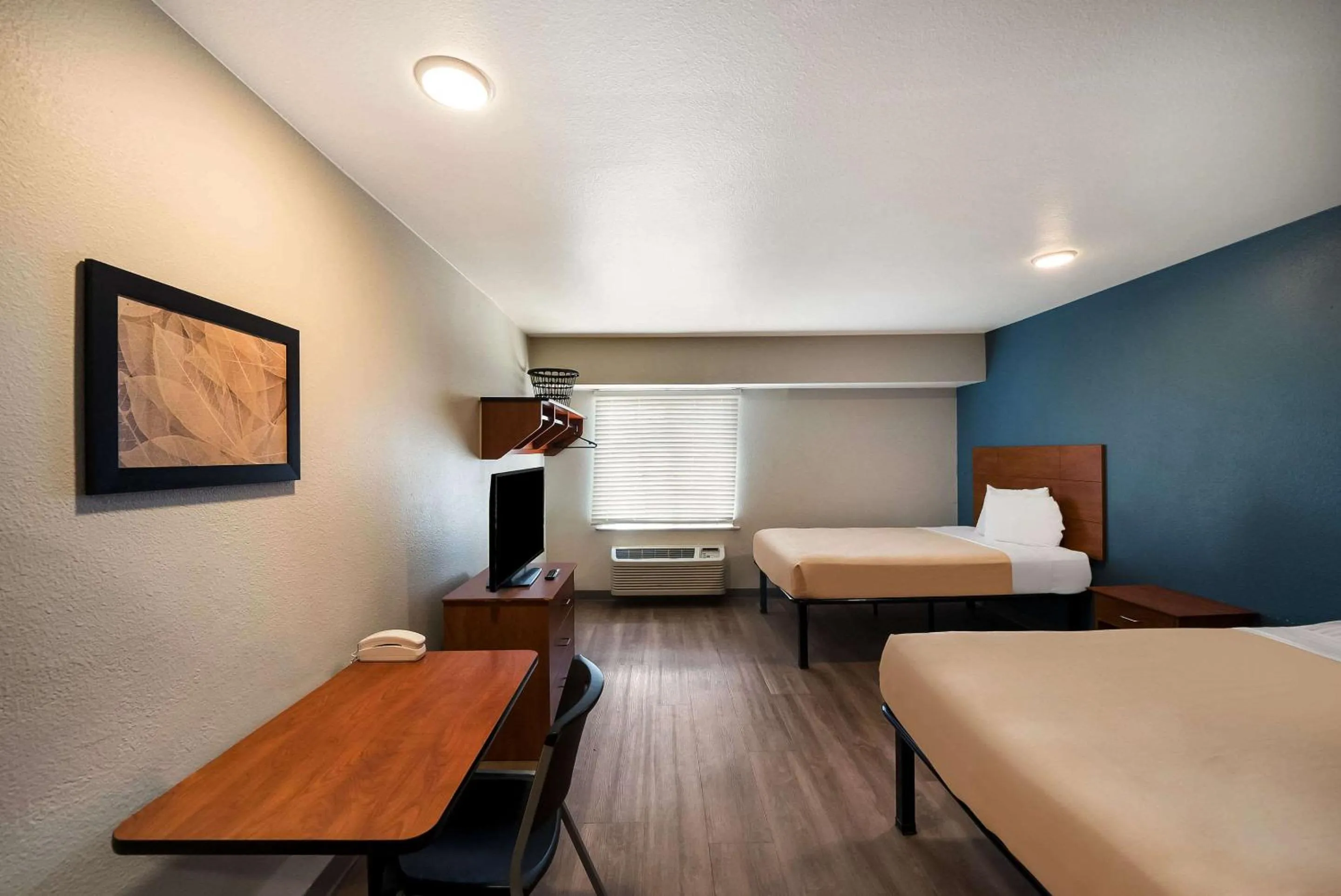 Bedroom, Bed in WoodSpring Suites Fort Worth Fossil Creek