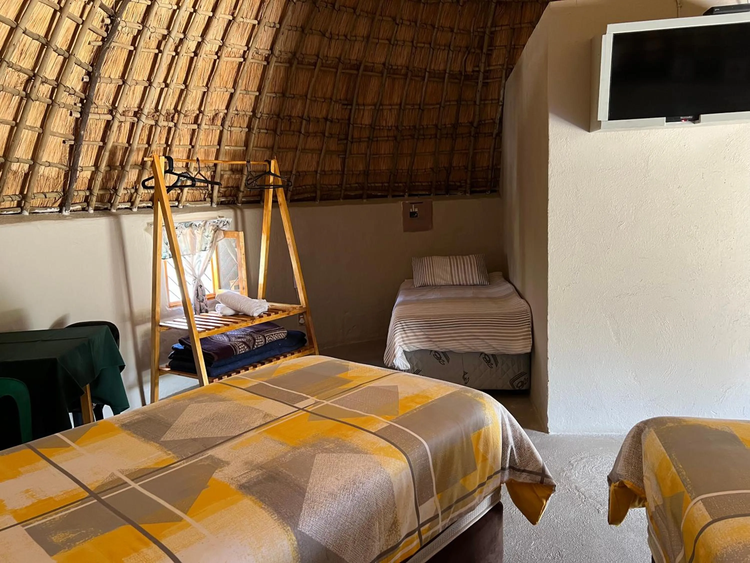 Bed in Kwakunje Guest Lodge