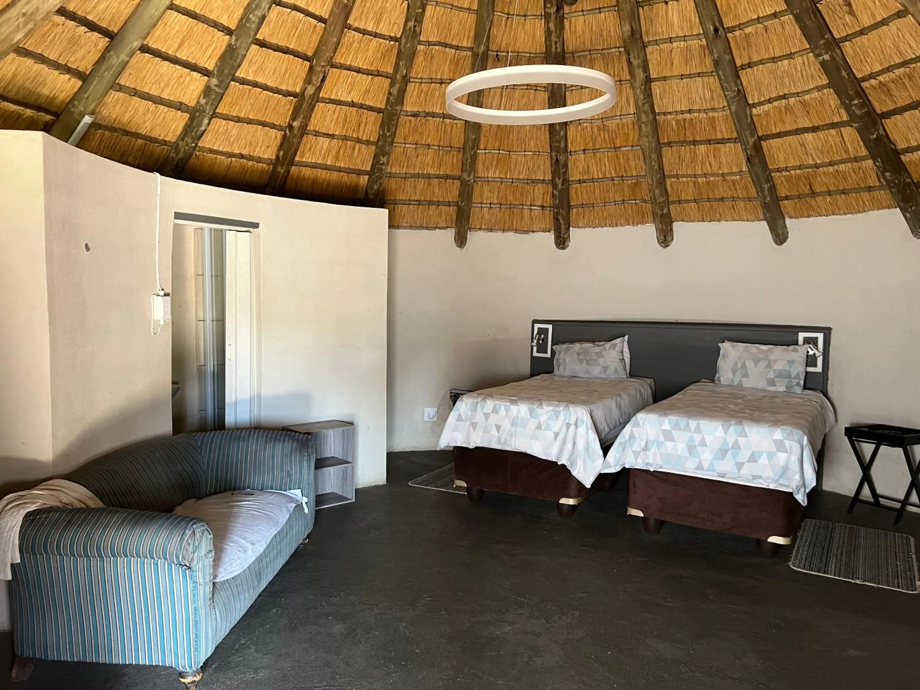 Bed in Kwakunje Guest Lodge