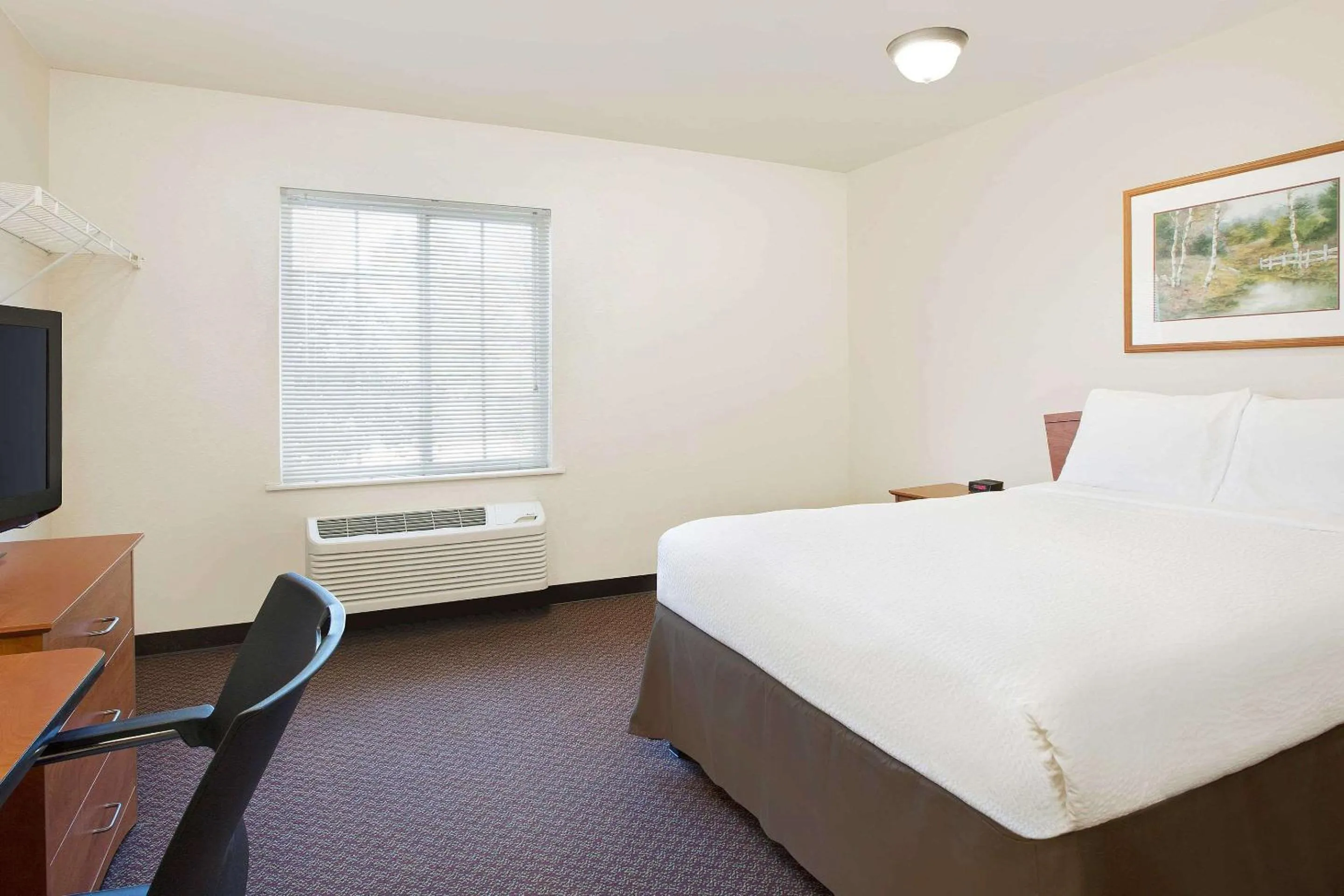 Photo of the whole room, Bed in WoodSpring Suites Fort Worth Forest Hill