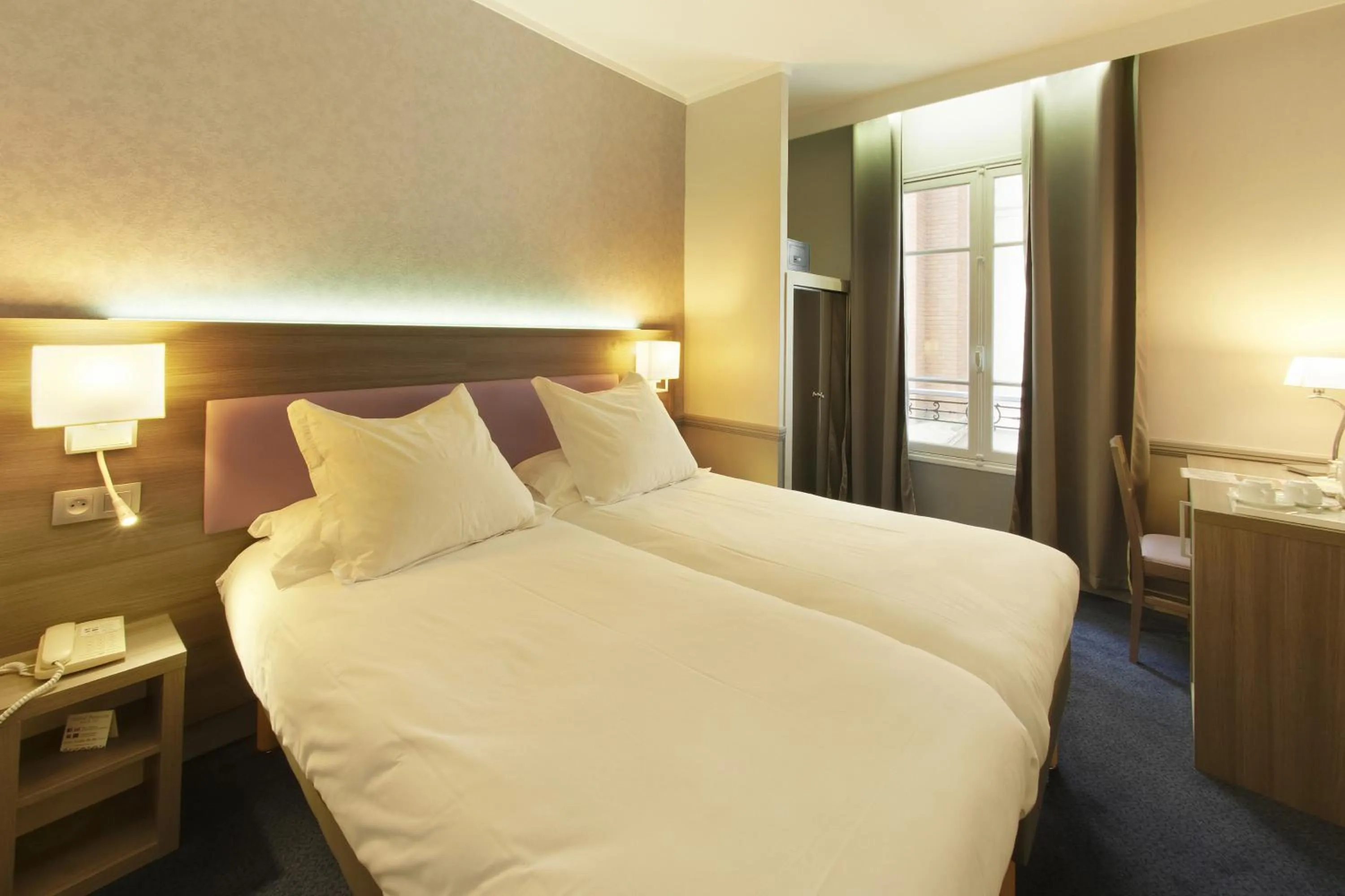 Photo of the whole room, Bed in Hôtel Poussin