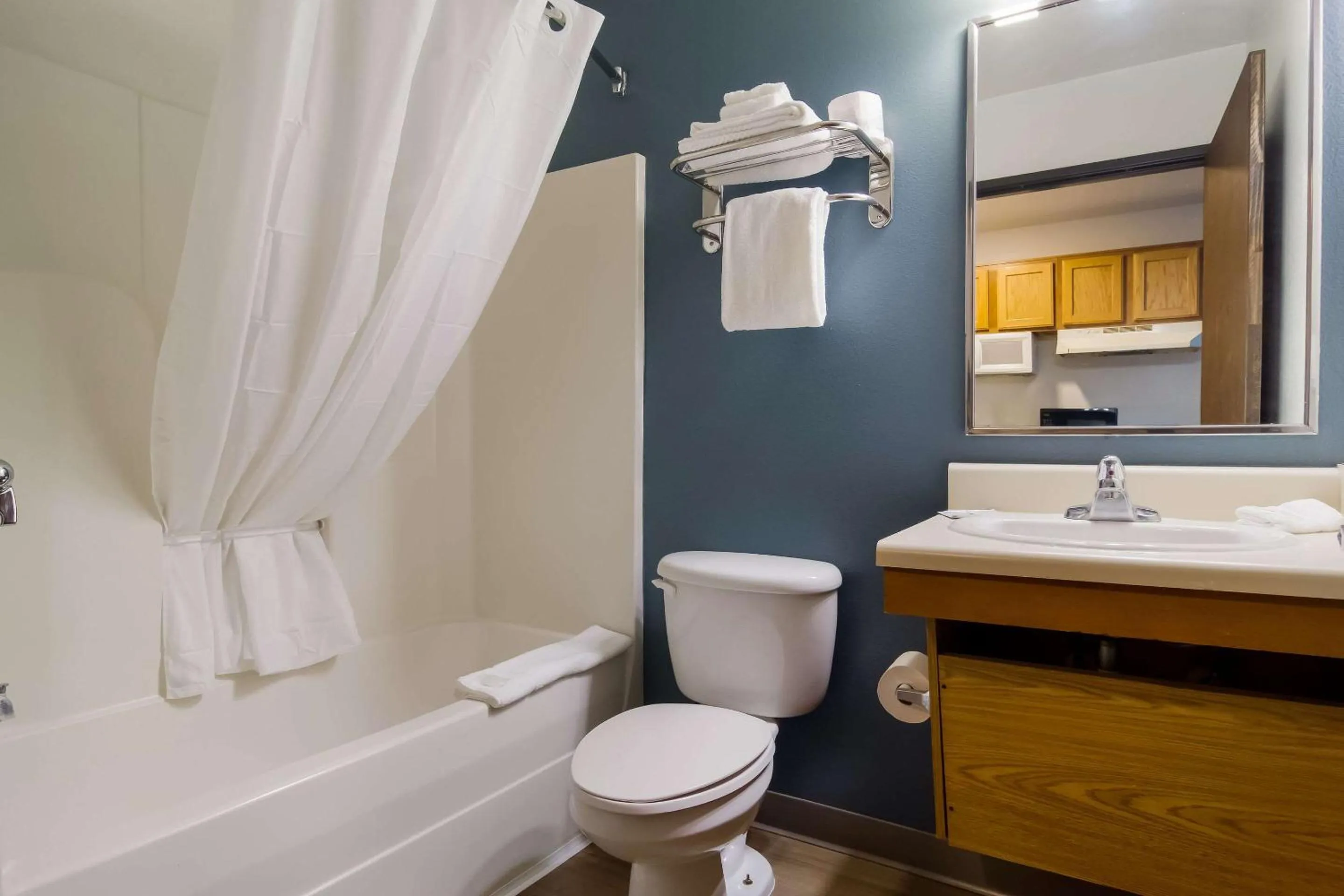 Bedroom in WoodSpring Suites Jacksonville I-295 East