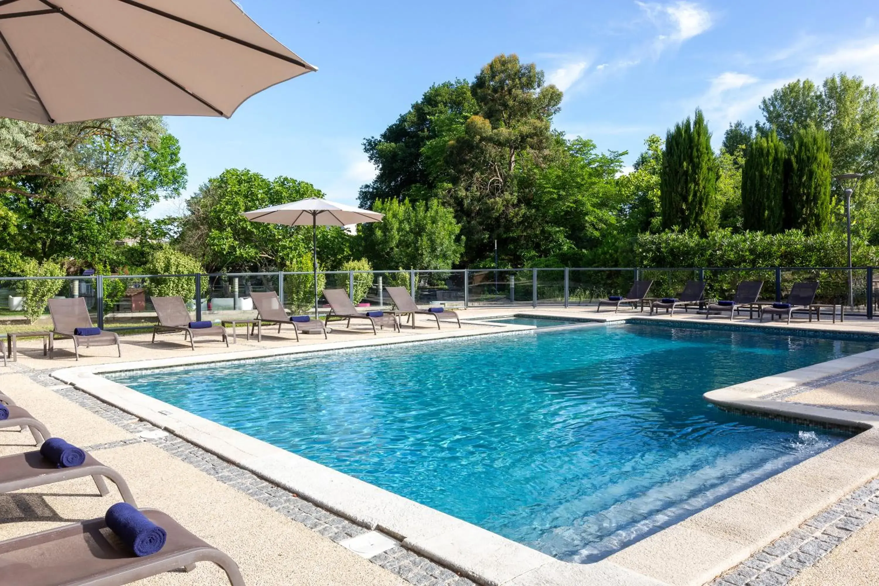 Swimming pool in SOWELL HOTELS Domaine de la Petite Isle Swimming pool in SOWELL HOTELS Domaine de la Petite Isle