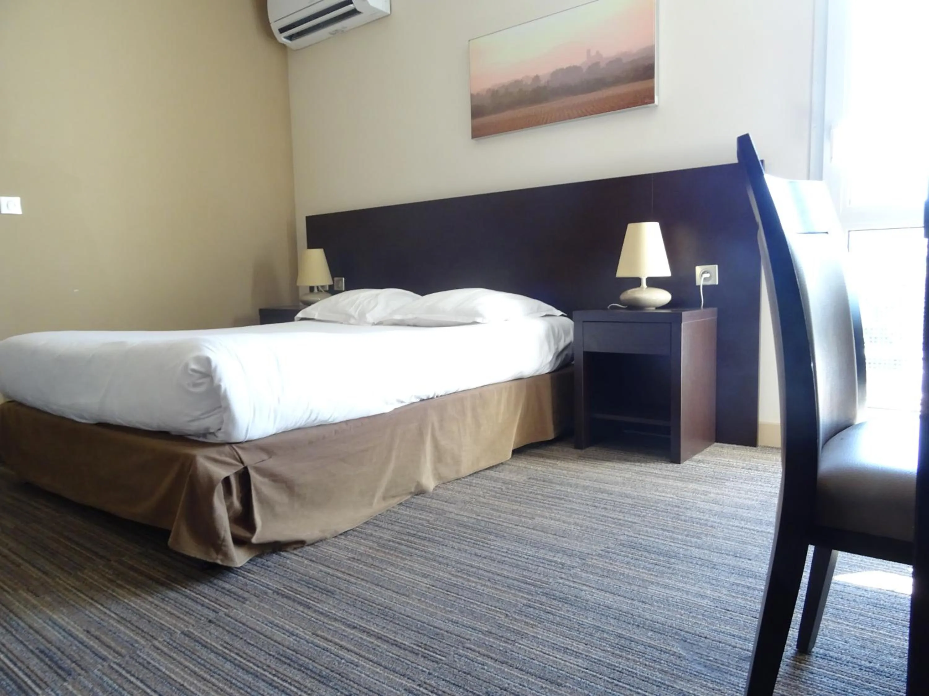 Bed in SOWELL HOTELS Domaine de la Petite Isle