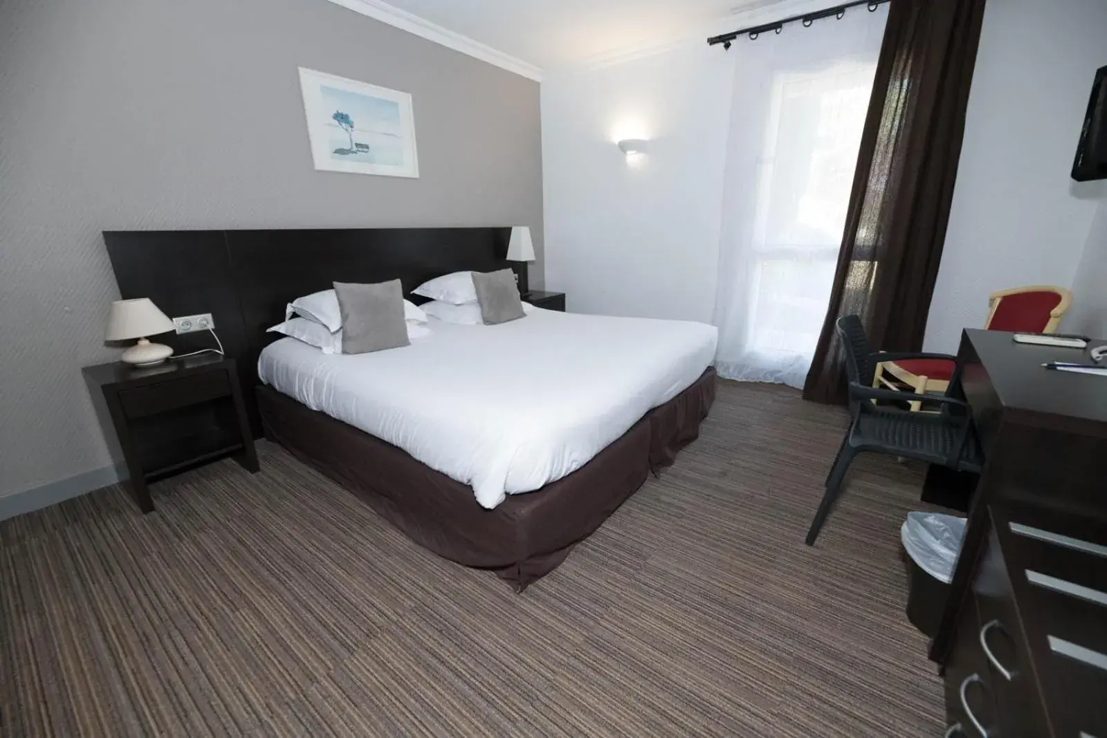 Triple Room in SOWELL HOTELS Domaine de la Petite Isle Triple Room in SOWELL HOTELS Domaine de la Petite Isle