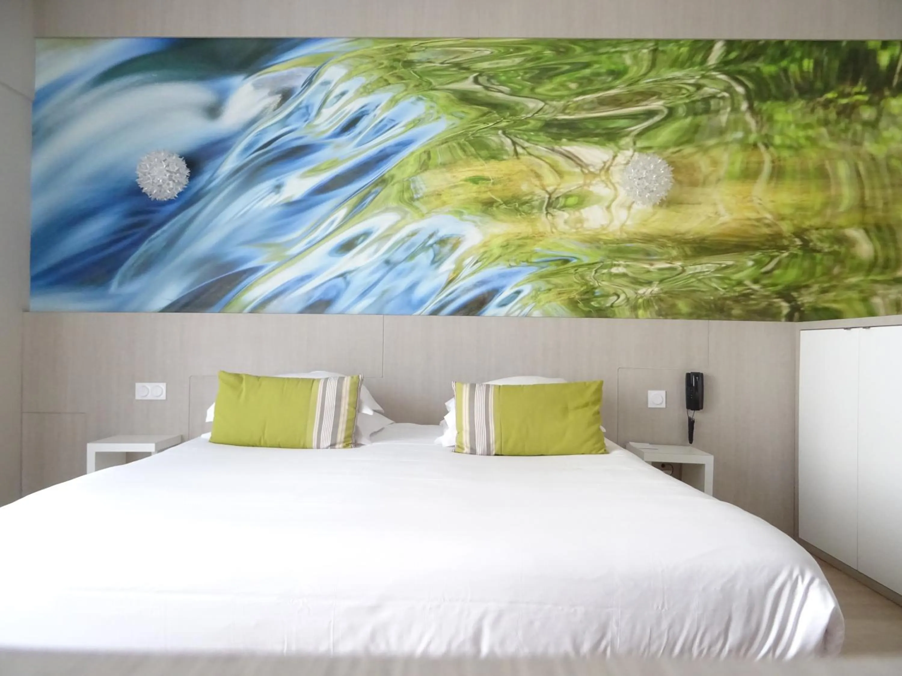 Bed in SOWELL HOTELS Domaine de la Petite Isle