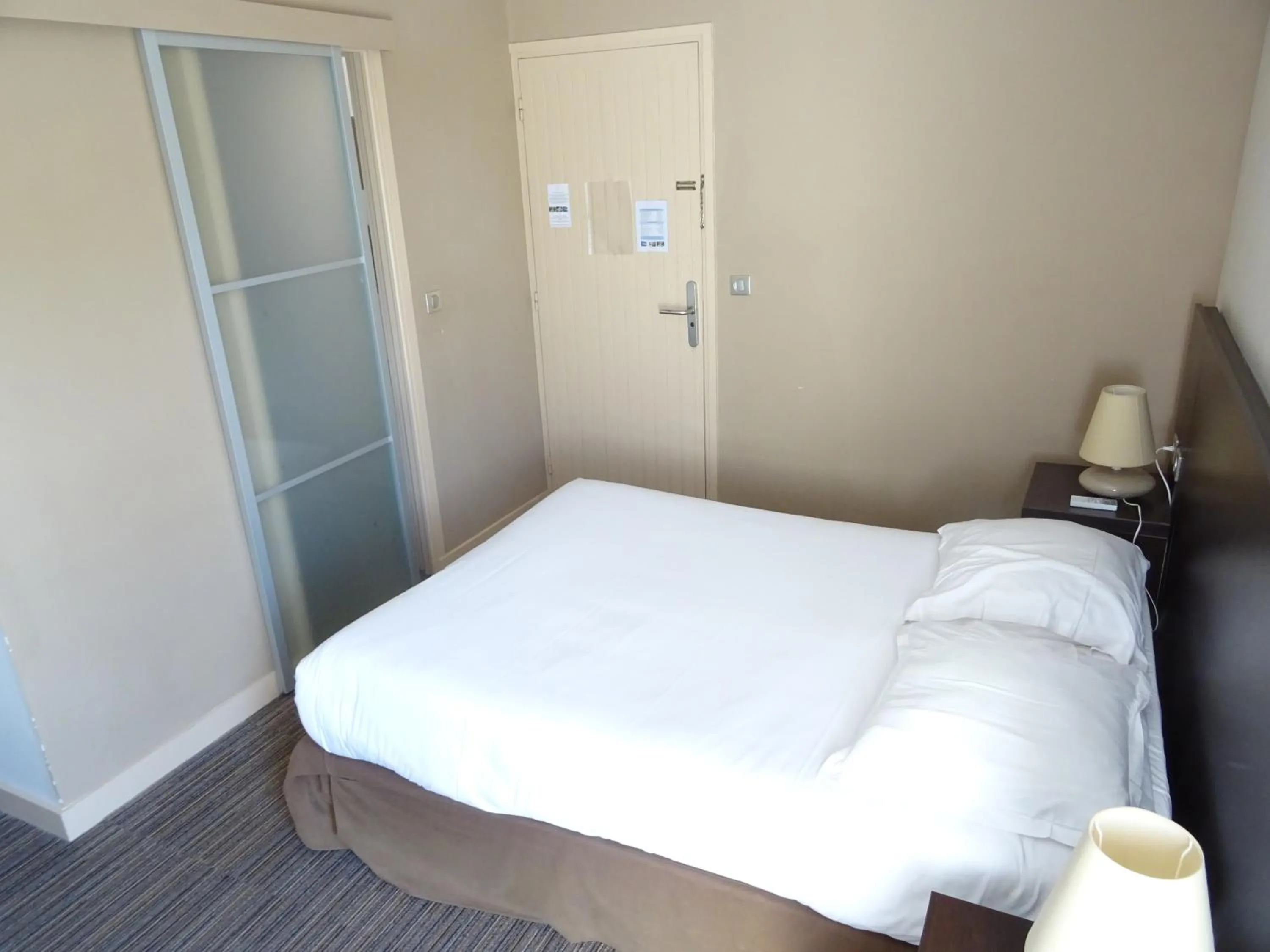 Bed in SOWELL HOTELS Domaine de la Petite Isle