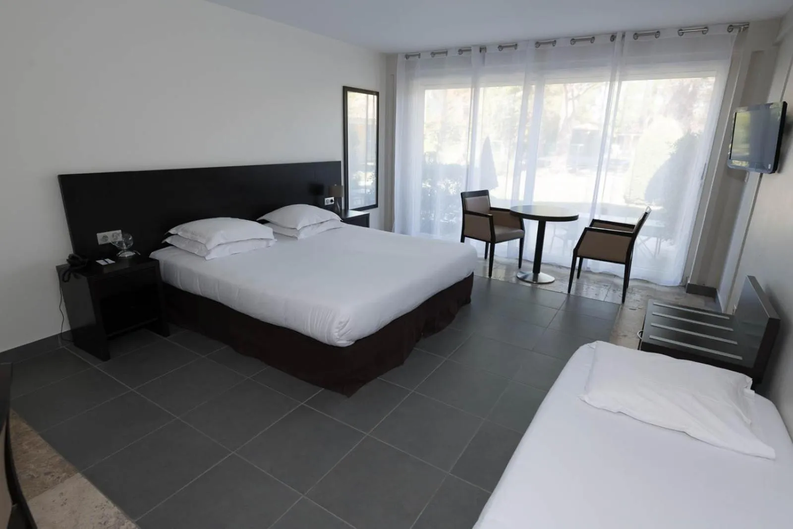 Bed in SOWELL HOTELS Domaine de la Petite Isle