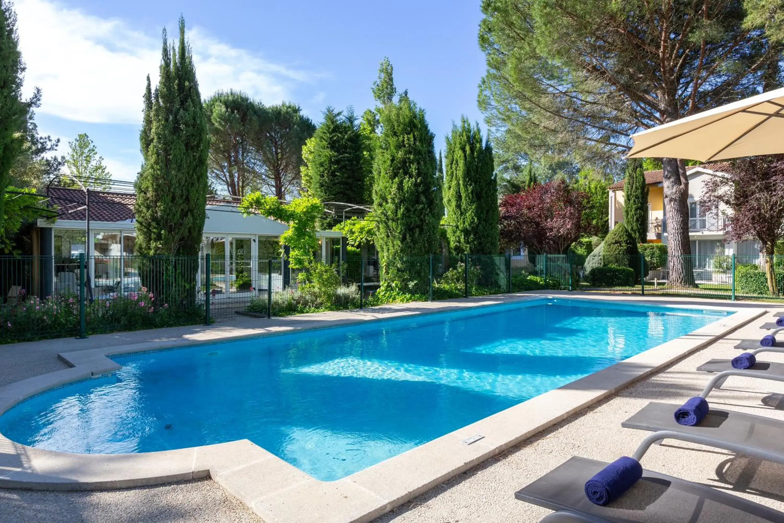 Swimming pool in SOWELL HOTELS Domaine de la Petite Isle Swimming pool in SOWELL HOTELS Domaine de la Petite Isle