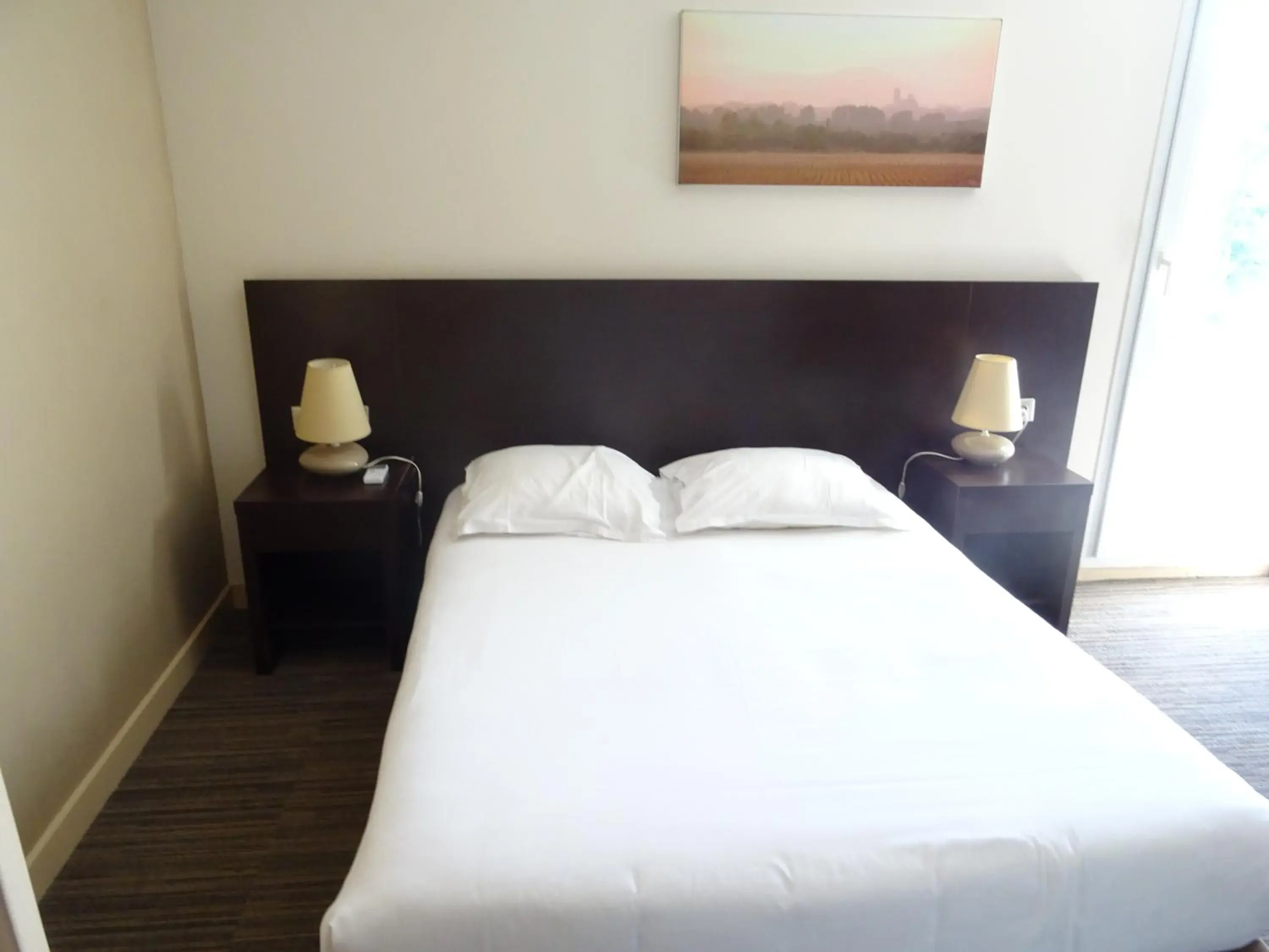Double or Twin Room with Garden Access in SOWELL HOTELS Domaine de la Petite Isle Double or Twin Room with Garden Access in SOWELL HOTELS Domaine de la Petite Isle