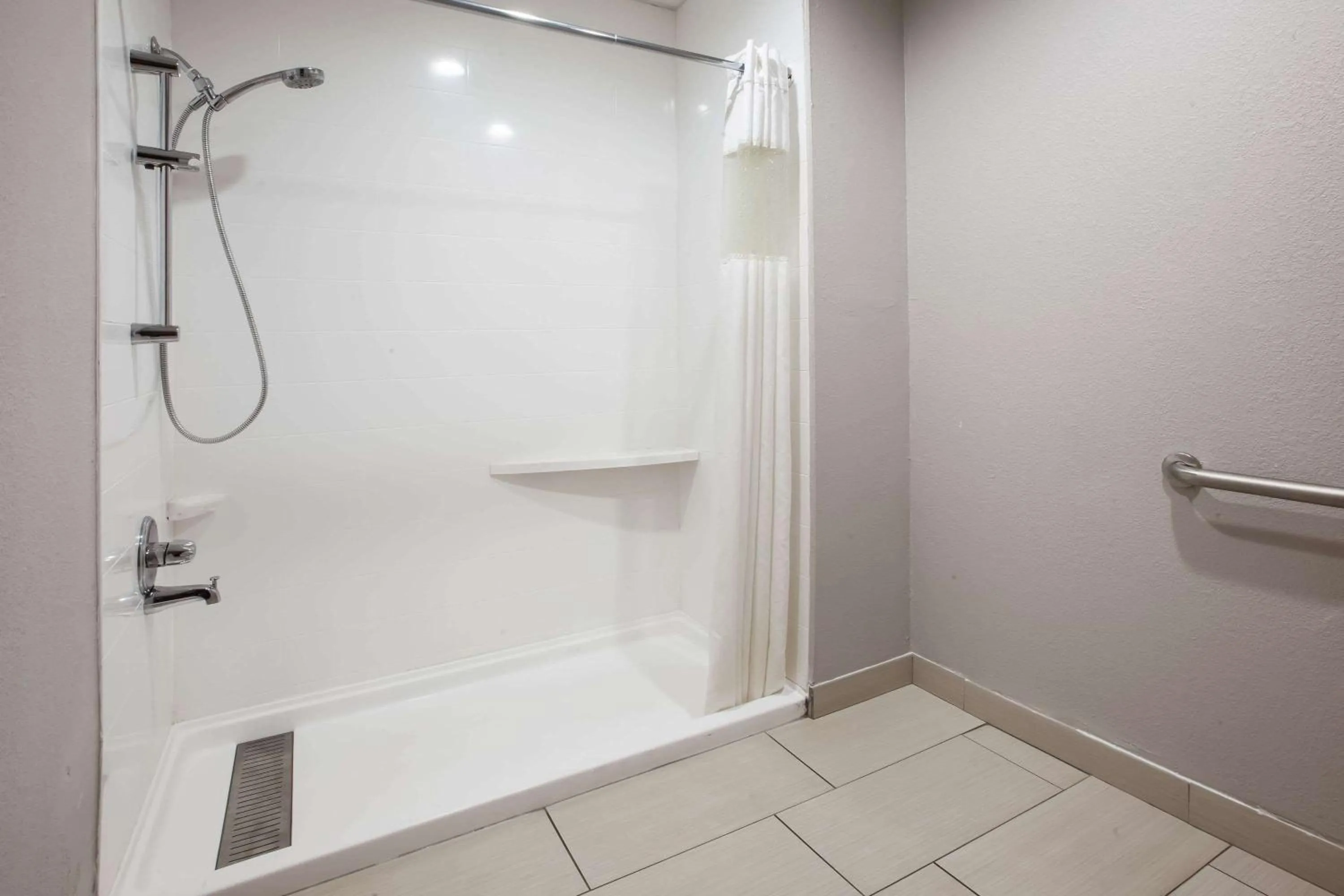 Shower in Baymont by Wyndham Traverse City