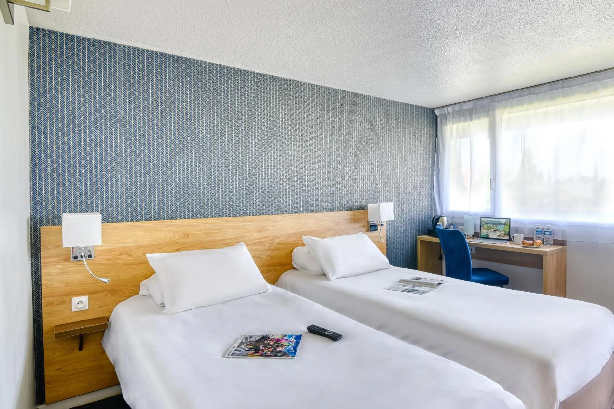 Photo of the whole room, Bed in Kyriad Montauban Sud - Albasud Photo of the whole room, Bed in Kyriad Montauban Sud - Albasud