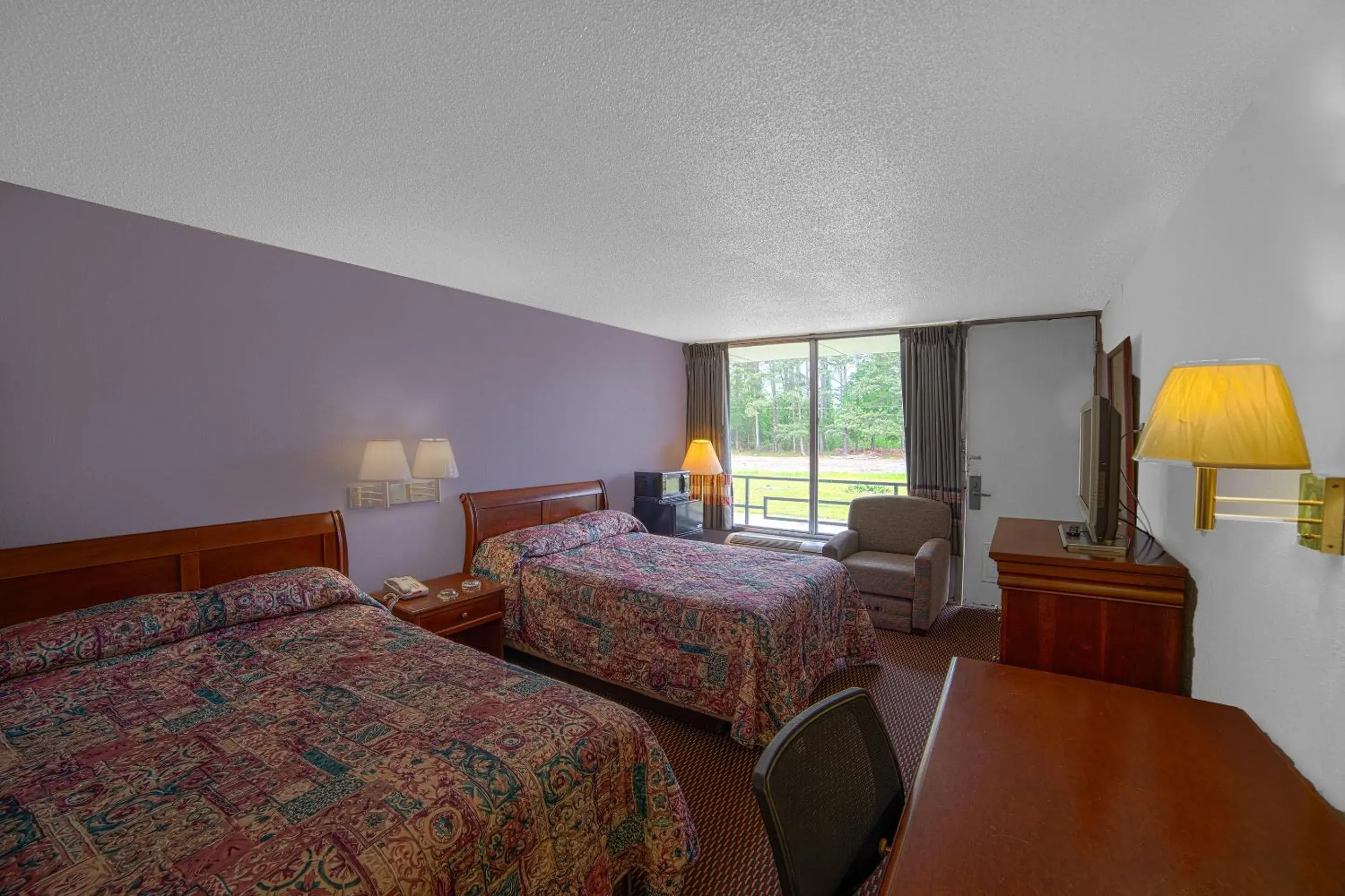 Bedroom, Bed in Masters Inn Selma Smithfield I-95 By OYO Bedroom, Bed in Masters Inn Selma Smithfield I-95 By OYO