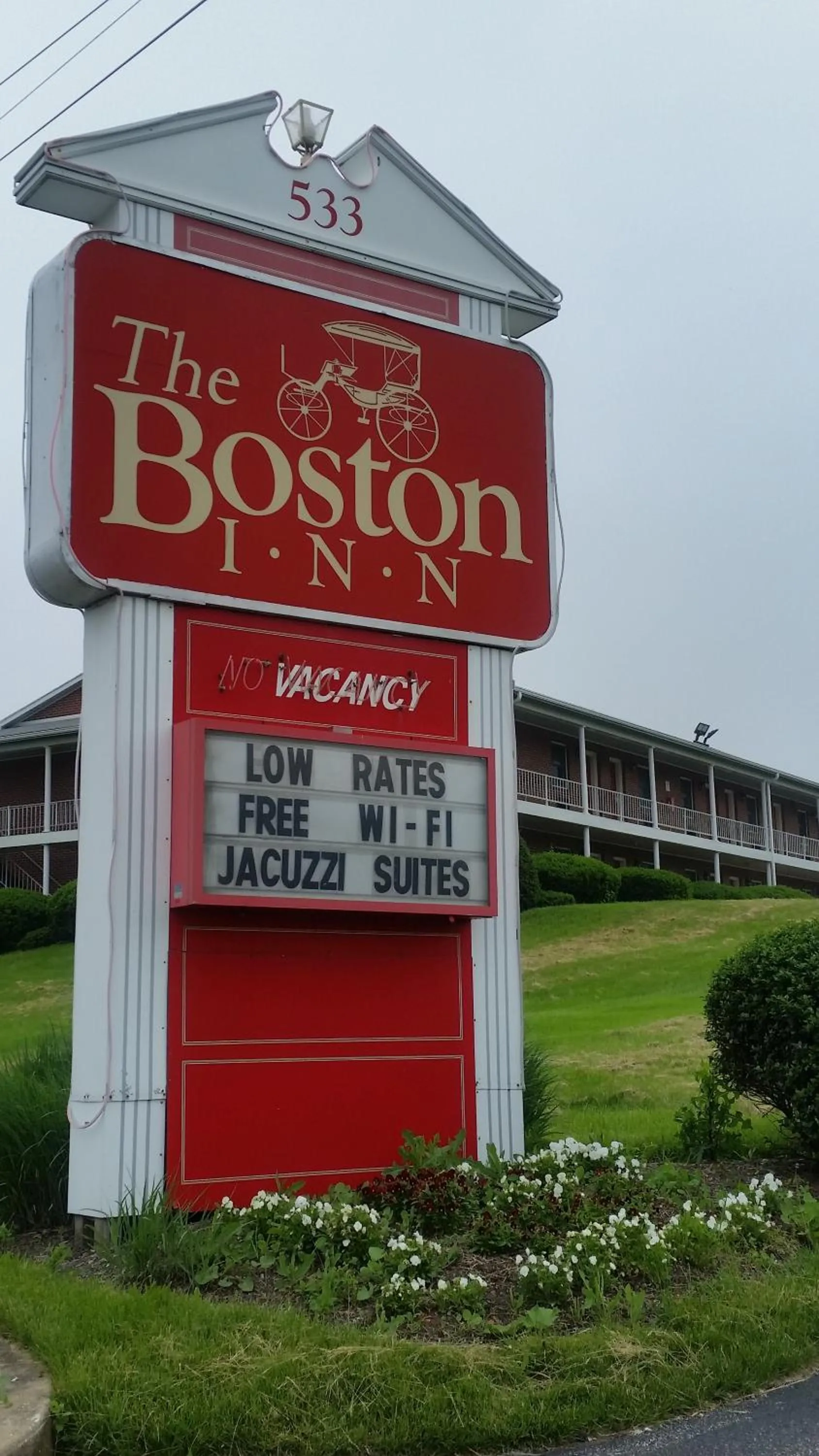 Property logo or sign in The Boston Inn