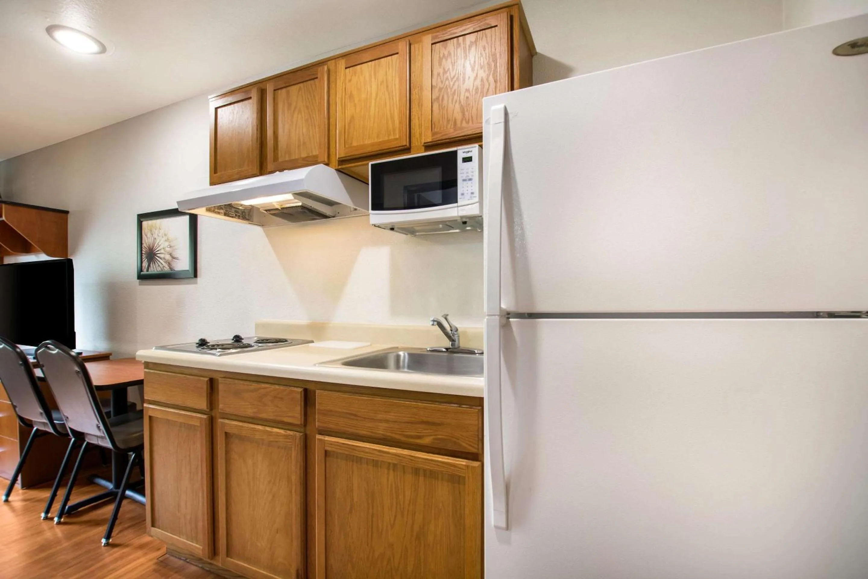 Bedroom in WoodSpring Suites Louisville Southeast