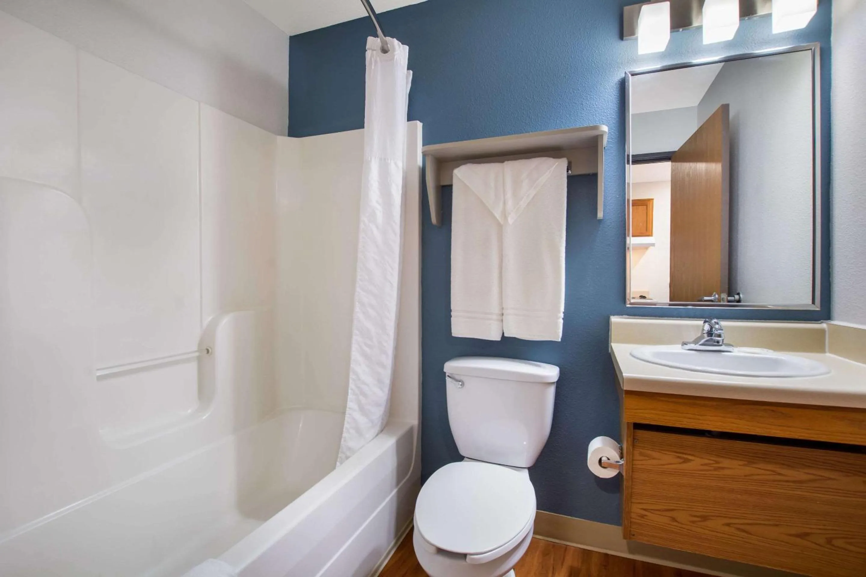 Bedroom in WoodSpring Suites Louisville Southeast