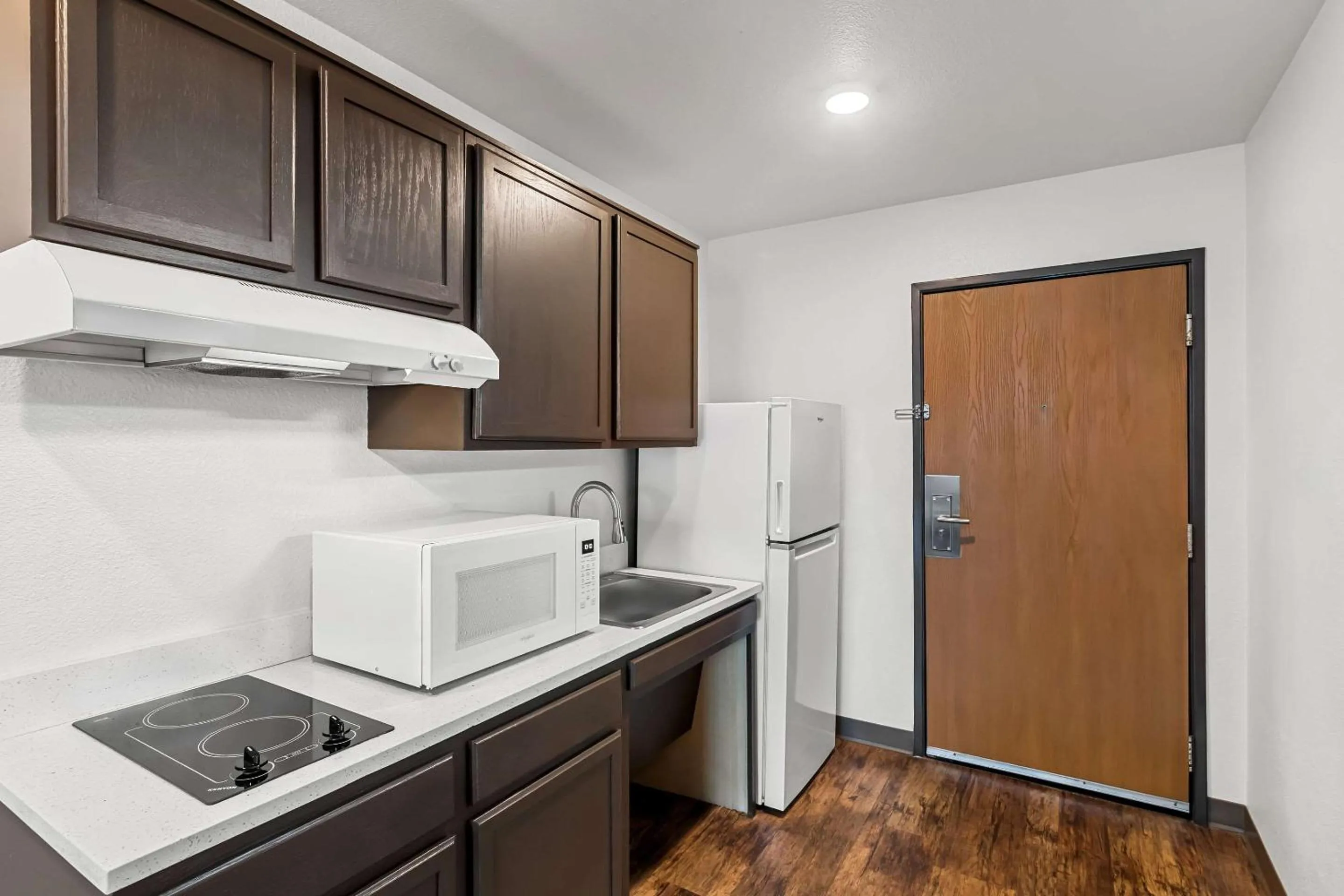 Kitchen or kitchenette in WoodSpring Suites Austin North I-35