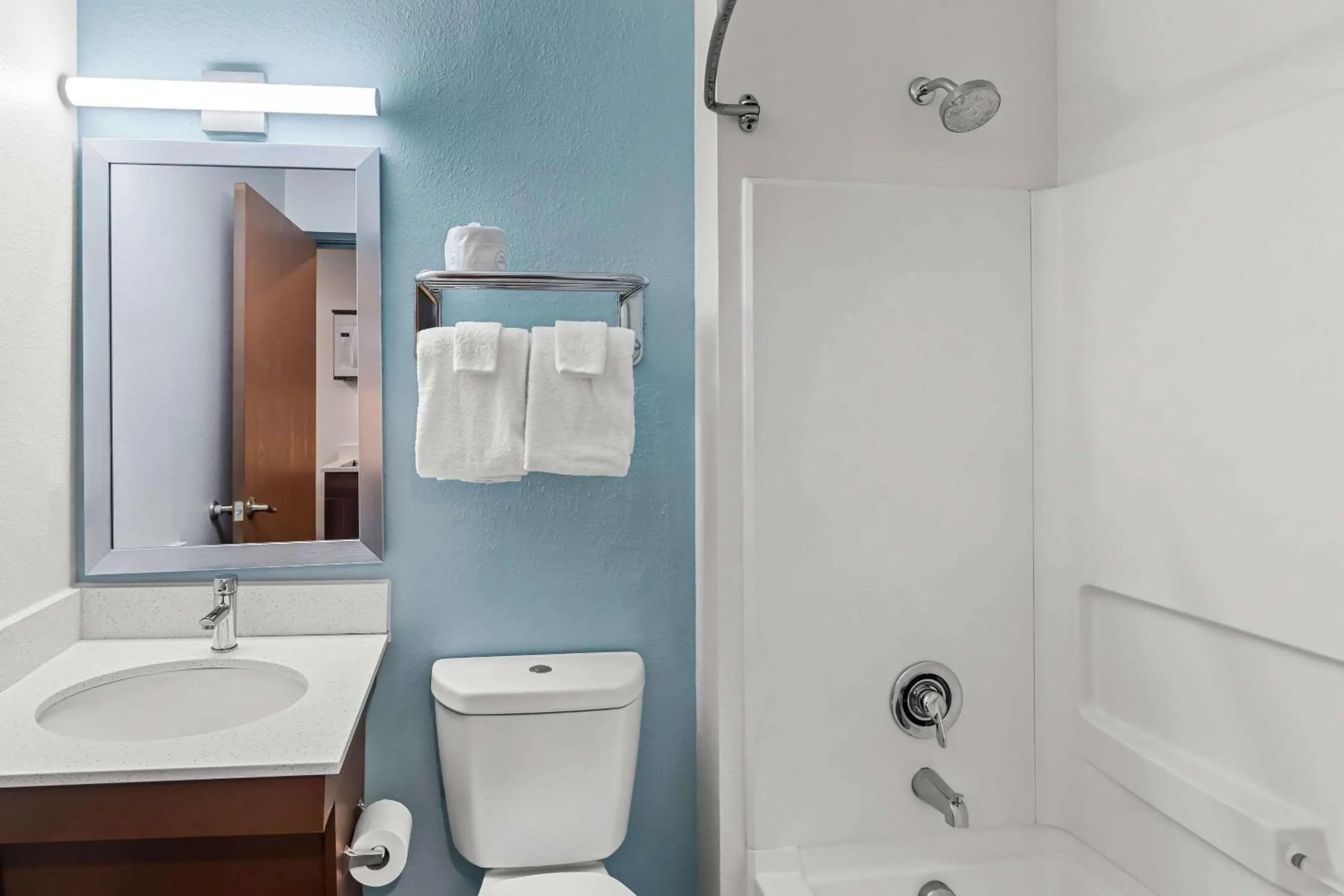 Bedroom in WoodSpring Suites Austin North I-35