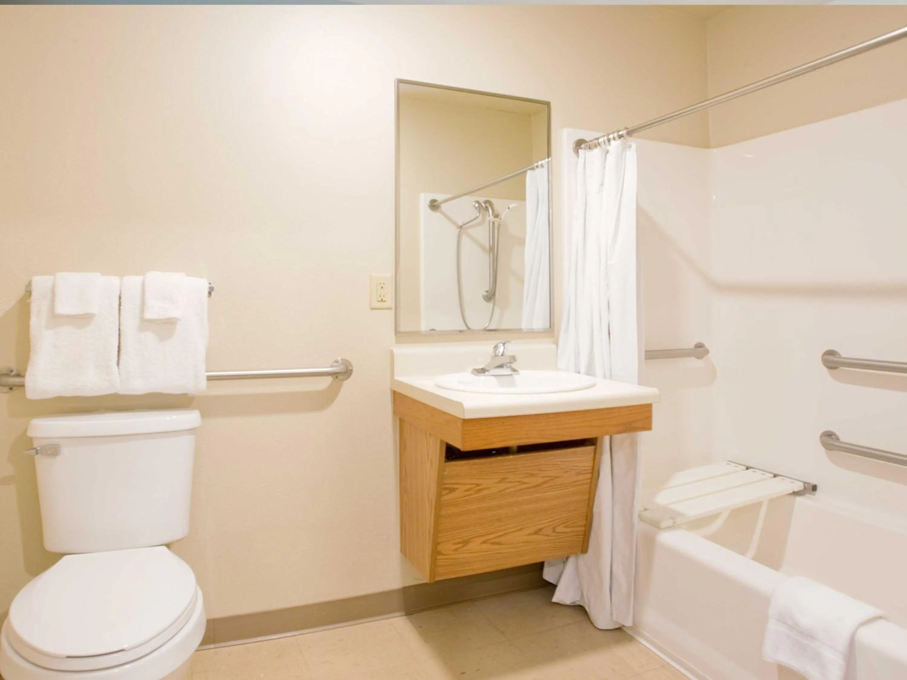 Bathroom in WoodSpring Suites Kansas City Lenexa