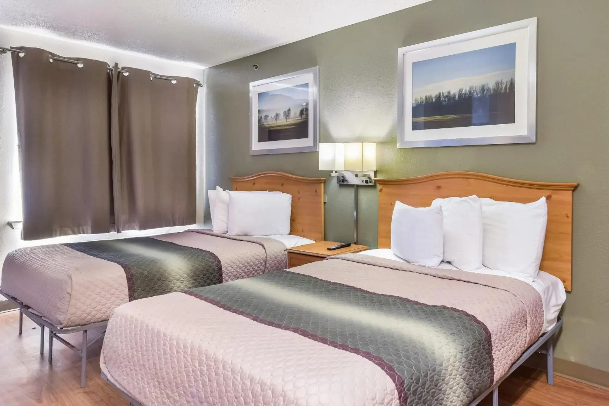 Photo of the whole room, Bed in HomeTowne Studios by Red Roof Dallas - North Addison - Tollway Photo of the whole room, Bed in HomeTowne Studios by Red Roof Dallas - North Addison - Tollway