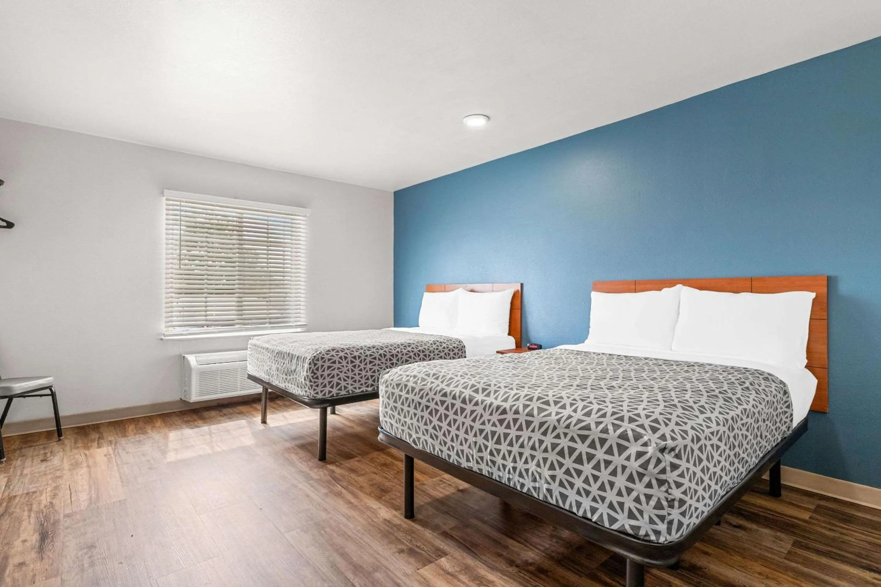 Bedroom, Bed in WoodSpring Suites Tulsa