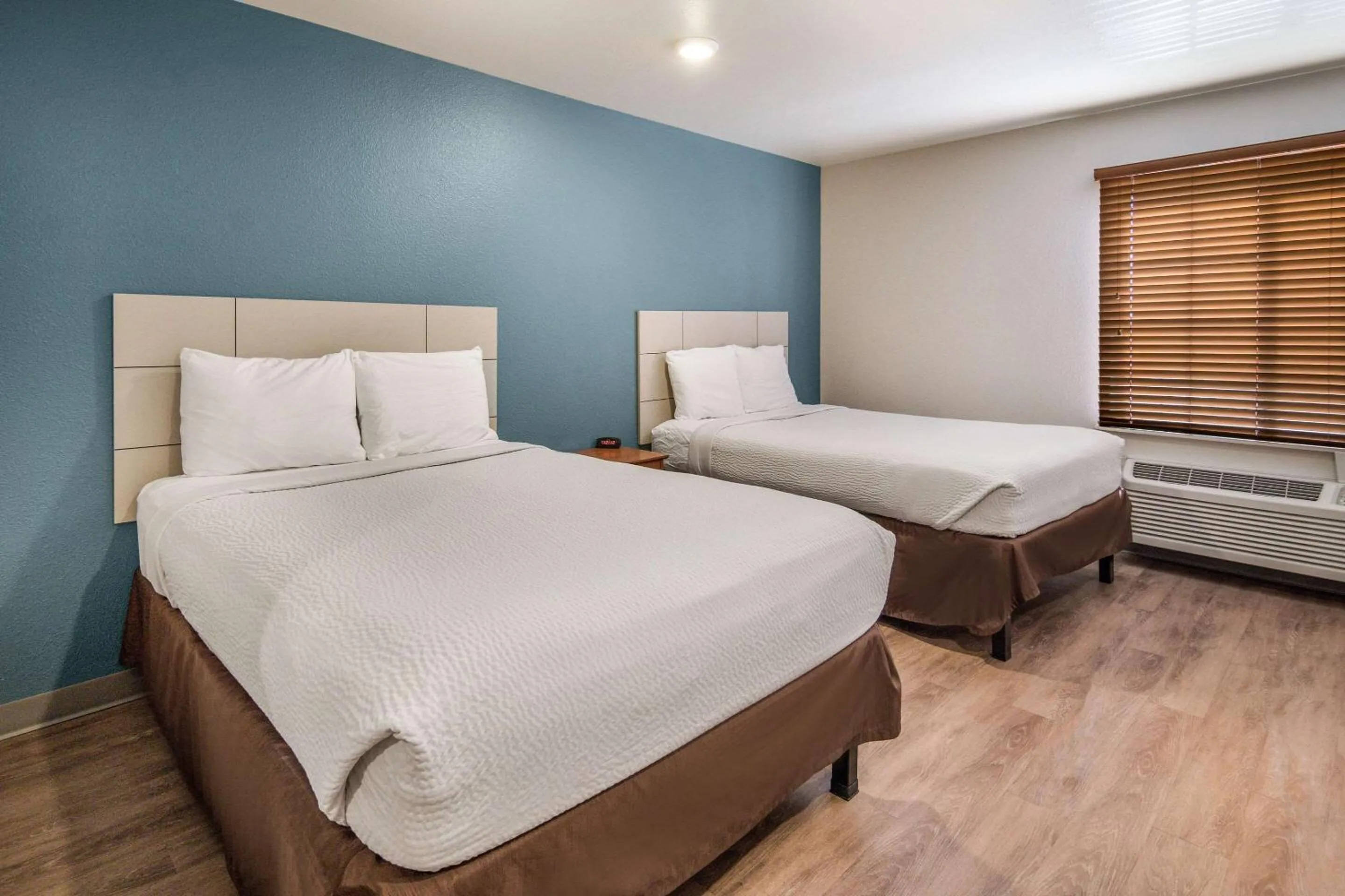 Photo of the whole room, Bed in WoodSpring Suites Denton