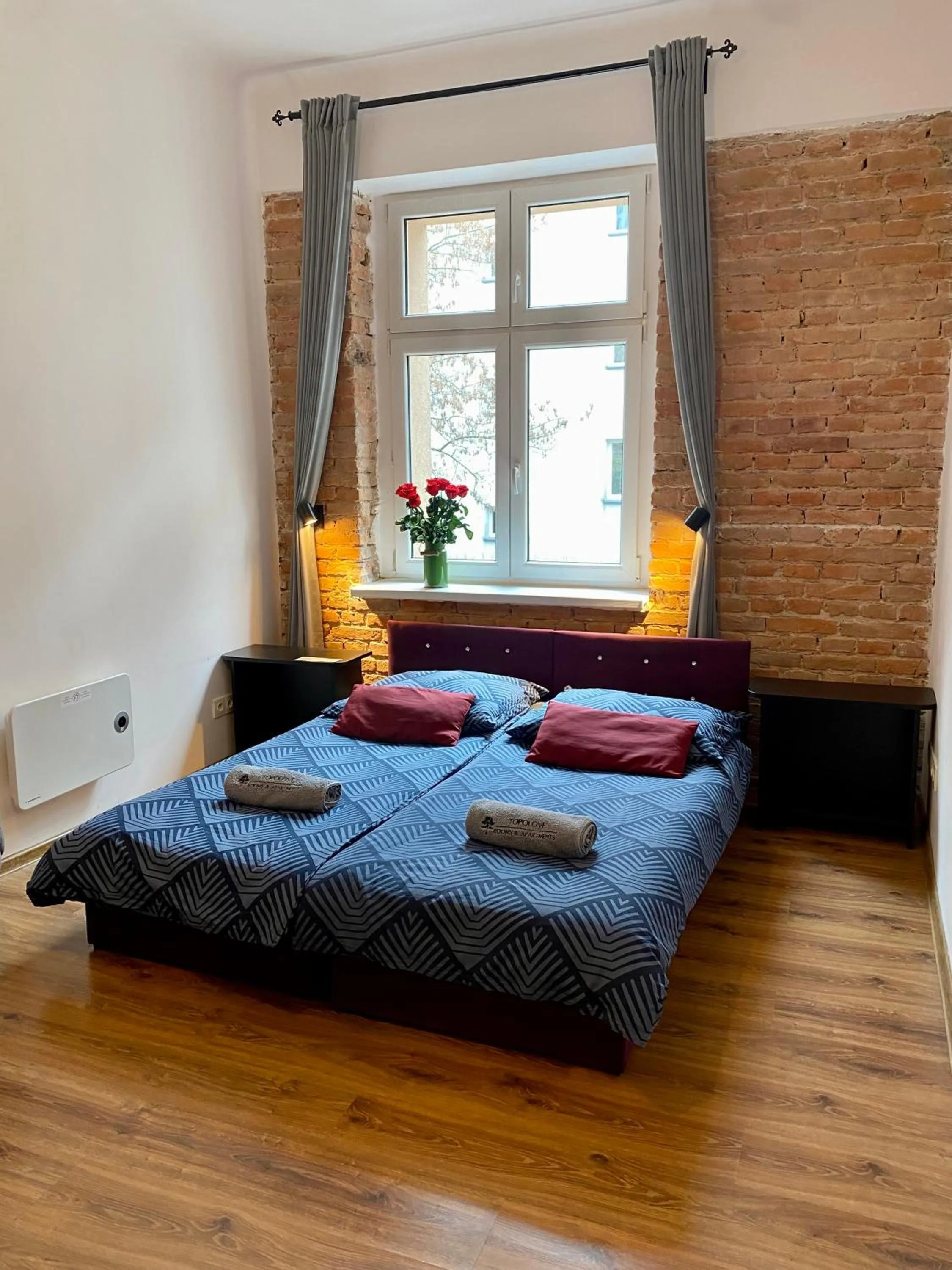 Bed in Topolove Rooms & Apartments