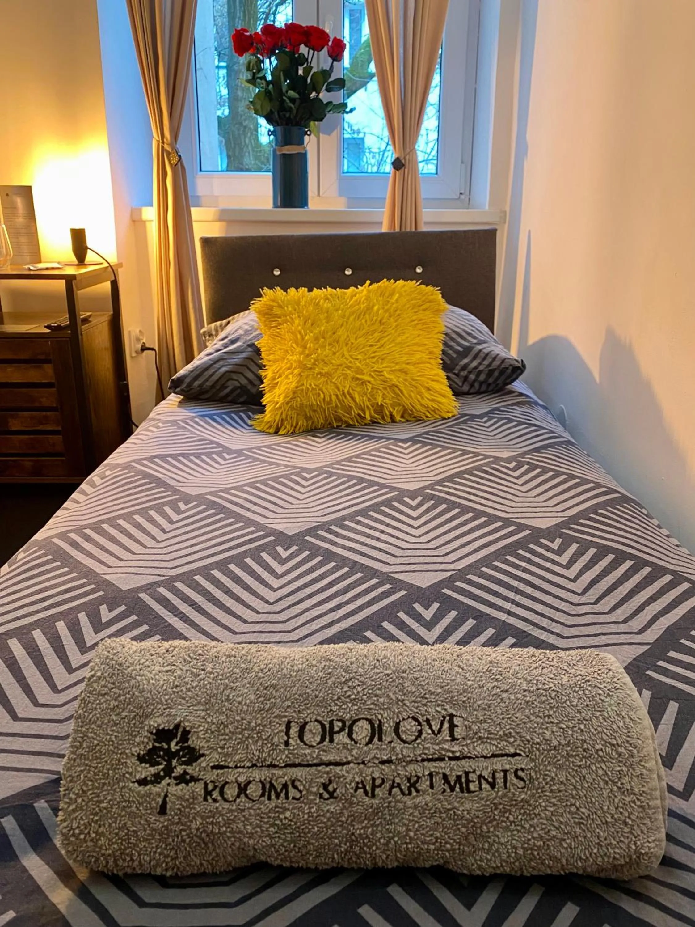 Bed in Topolove Rooms & Apartments