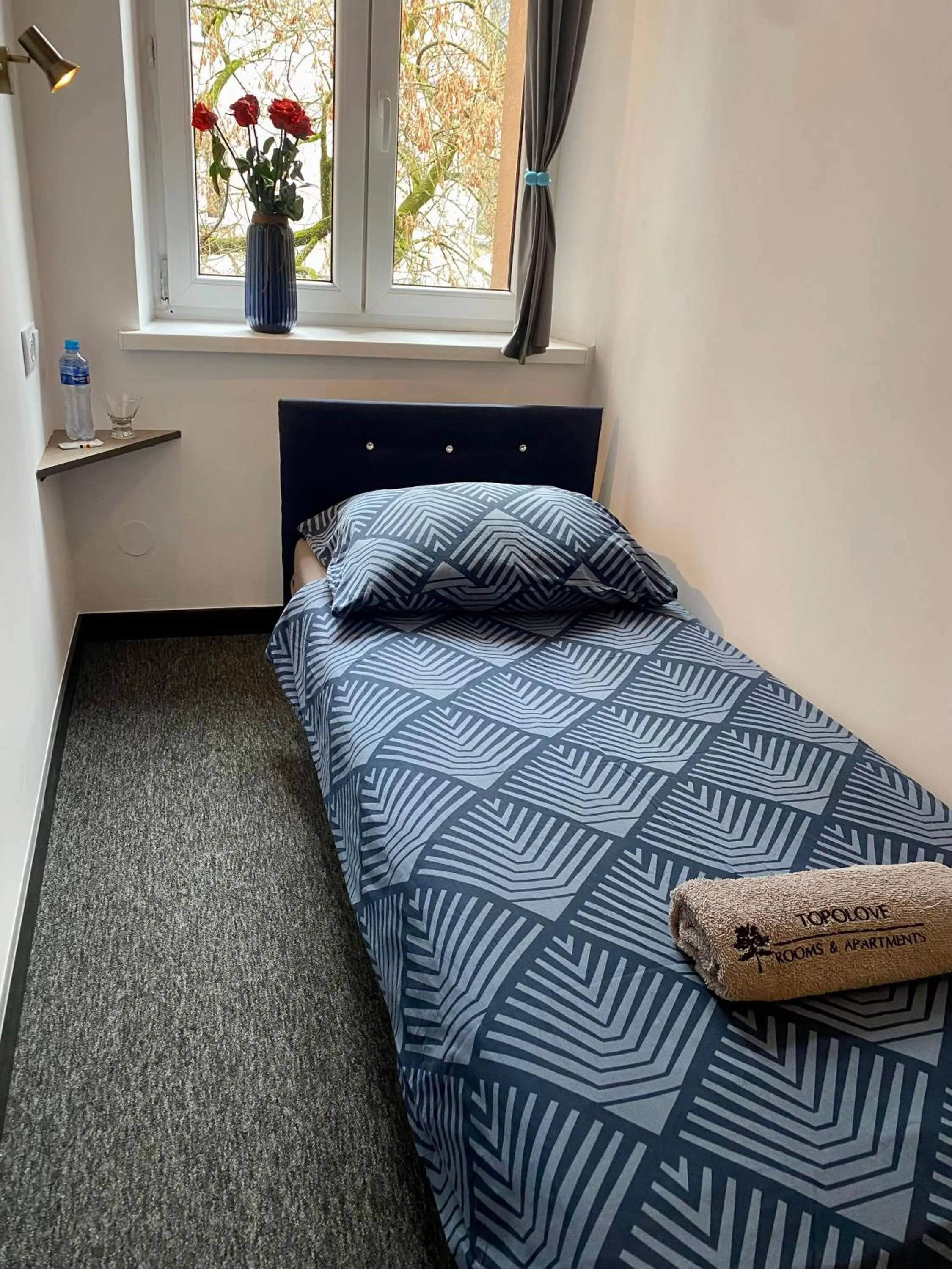 Bed in Topolove Rooms & Apartments