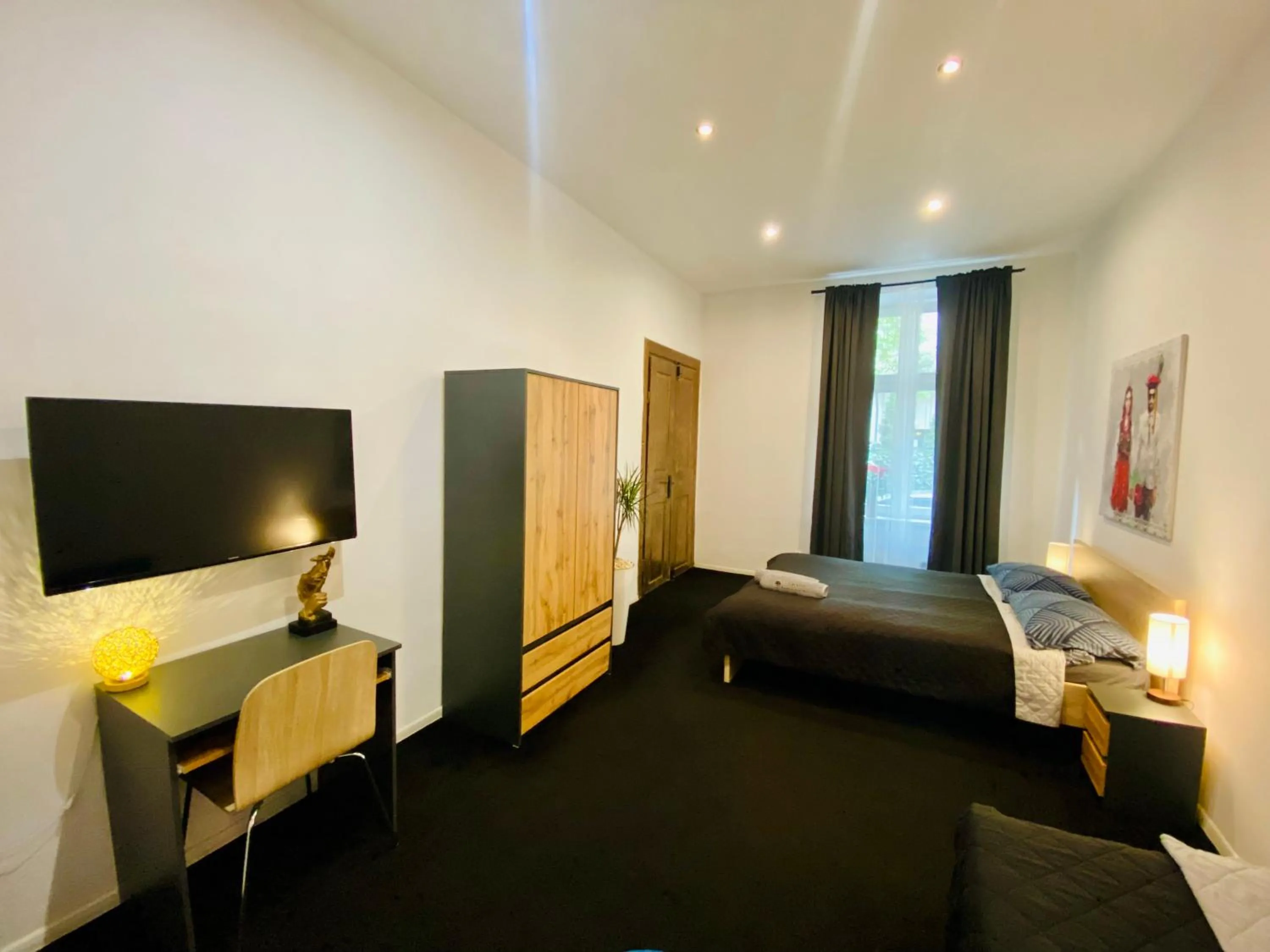 Bed in Topolove Rooms & Apartments