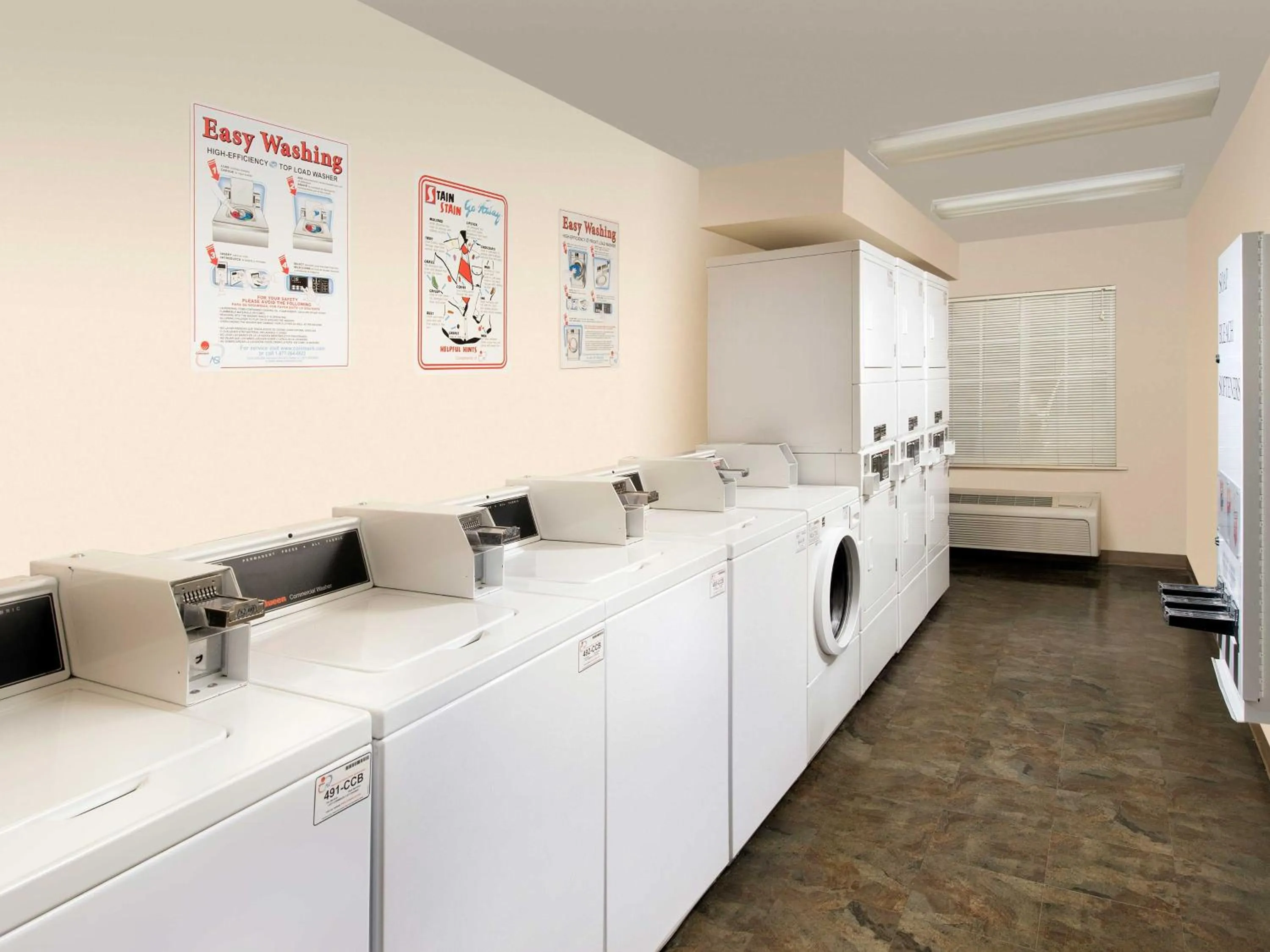 laundry in WoodSpring Suites Kansas City Mission