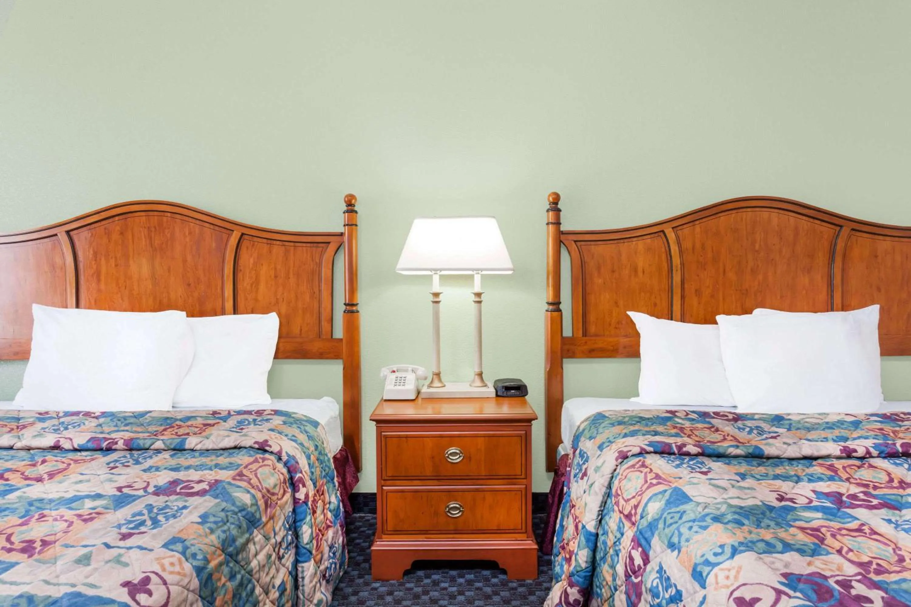 Photo of the whole room in Days Inn & Suites by Wyndham SE Columbia Ft Jackson