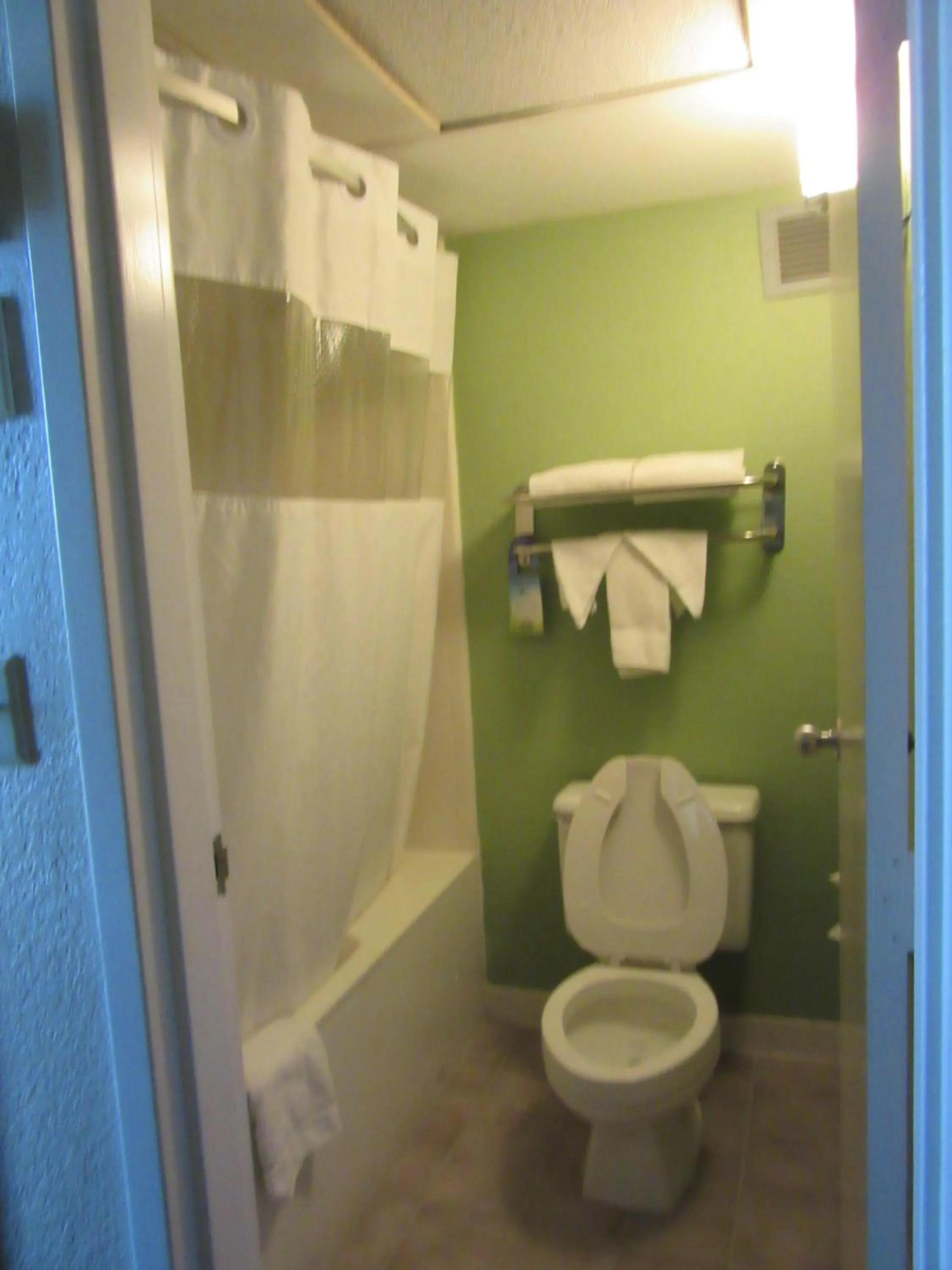 Bathroom in Days Inn & Suites by Wyndham SE Columbia Ft Jackson